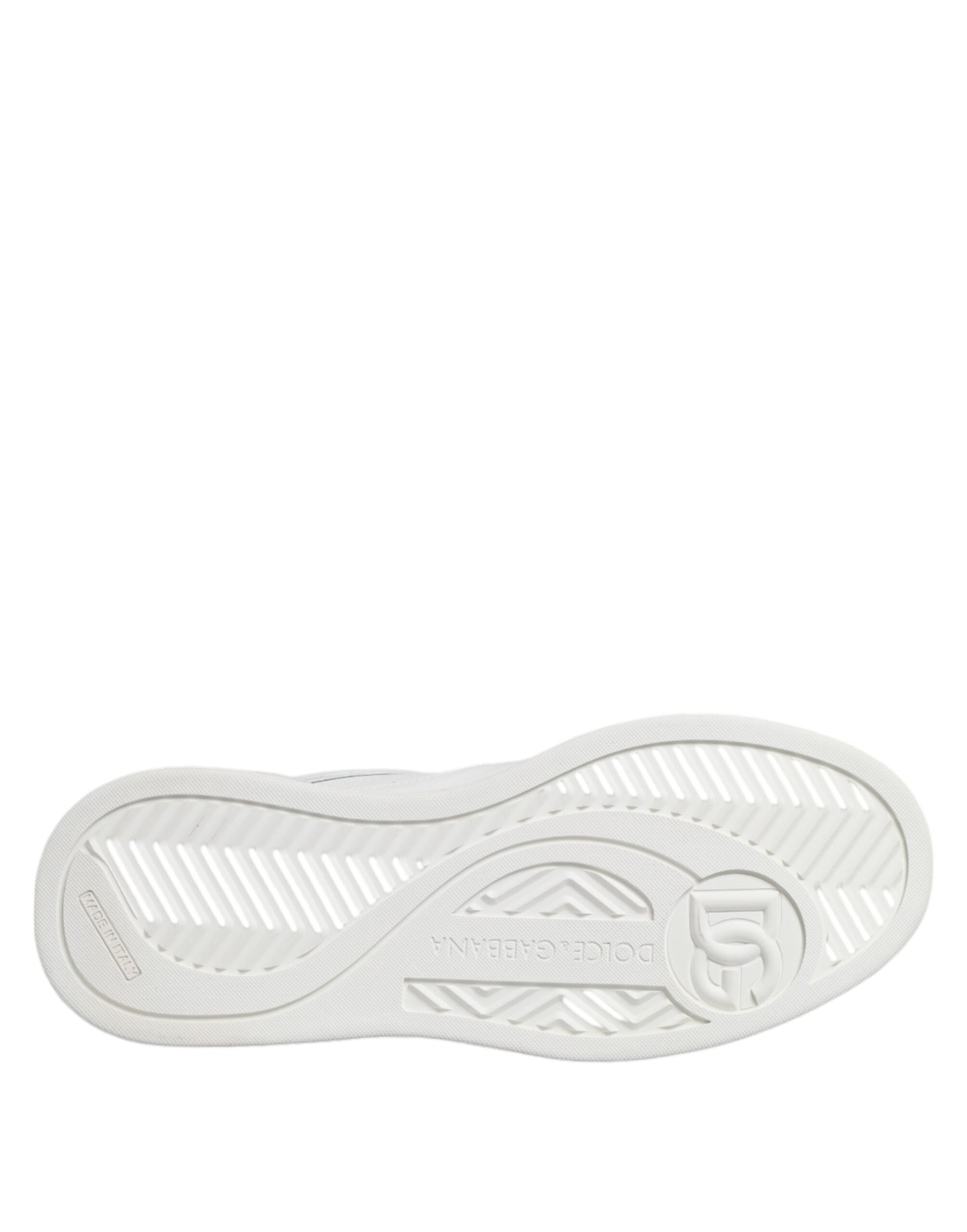 White leather slip-on shoes with embossed logo, featuring a low top and a textured sole