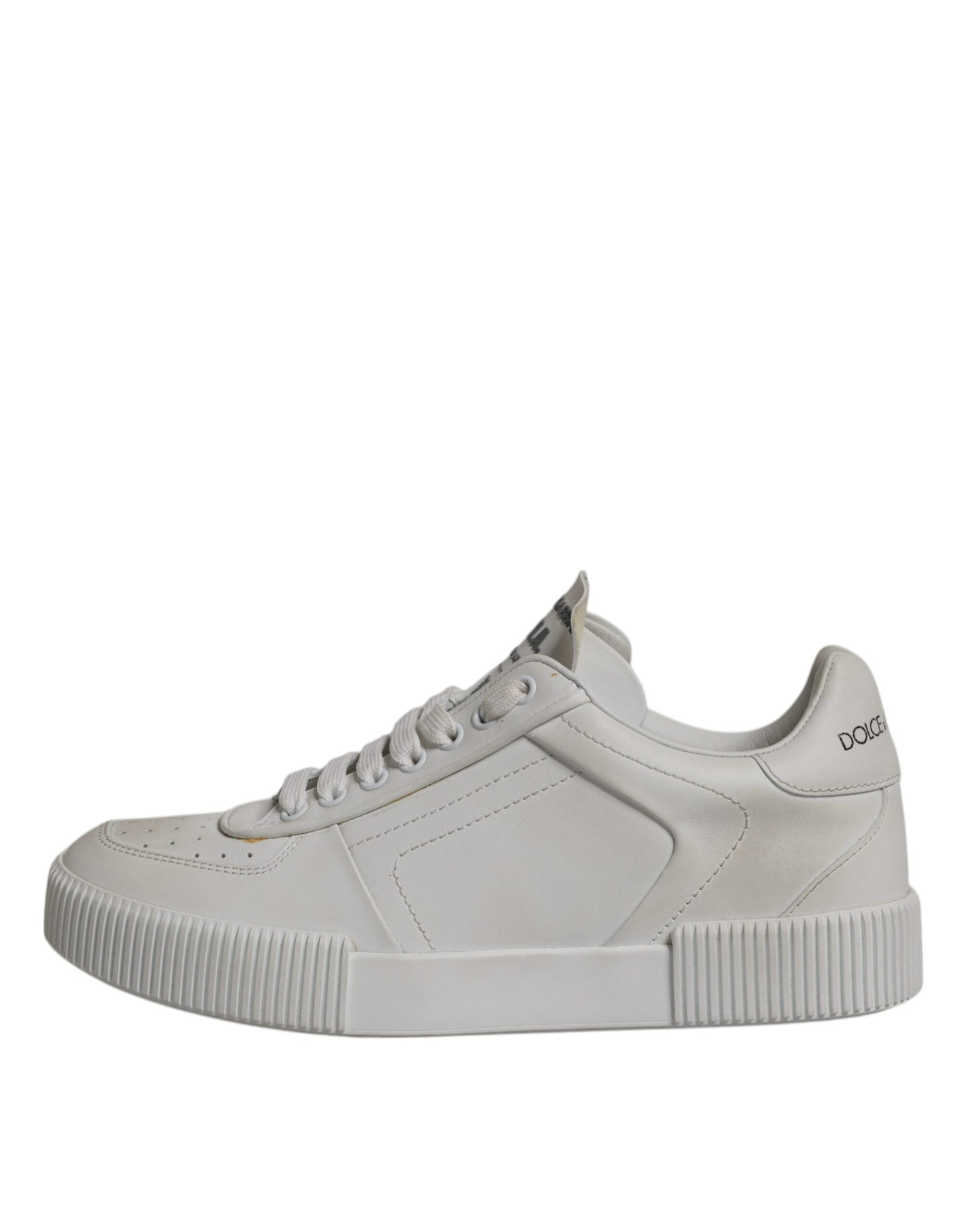 White leather sneakers with low top, laces, and chunky sole