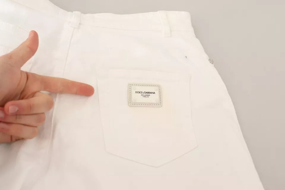 White pants with a label on the left side pocket
