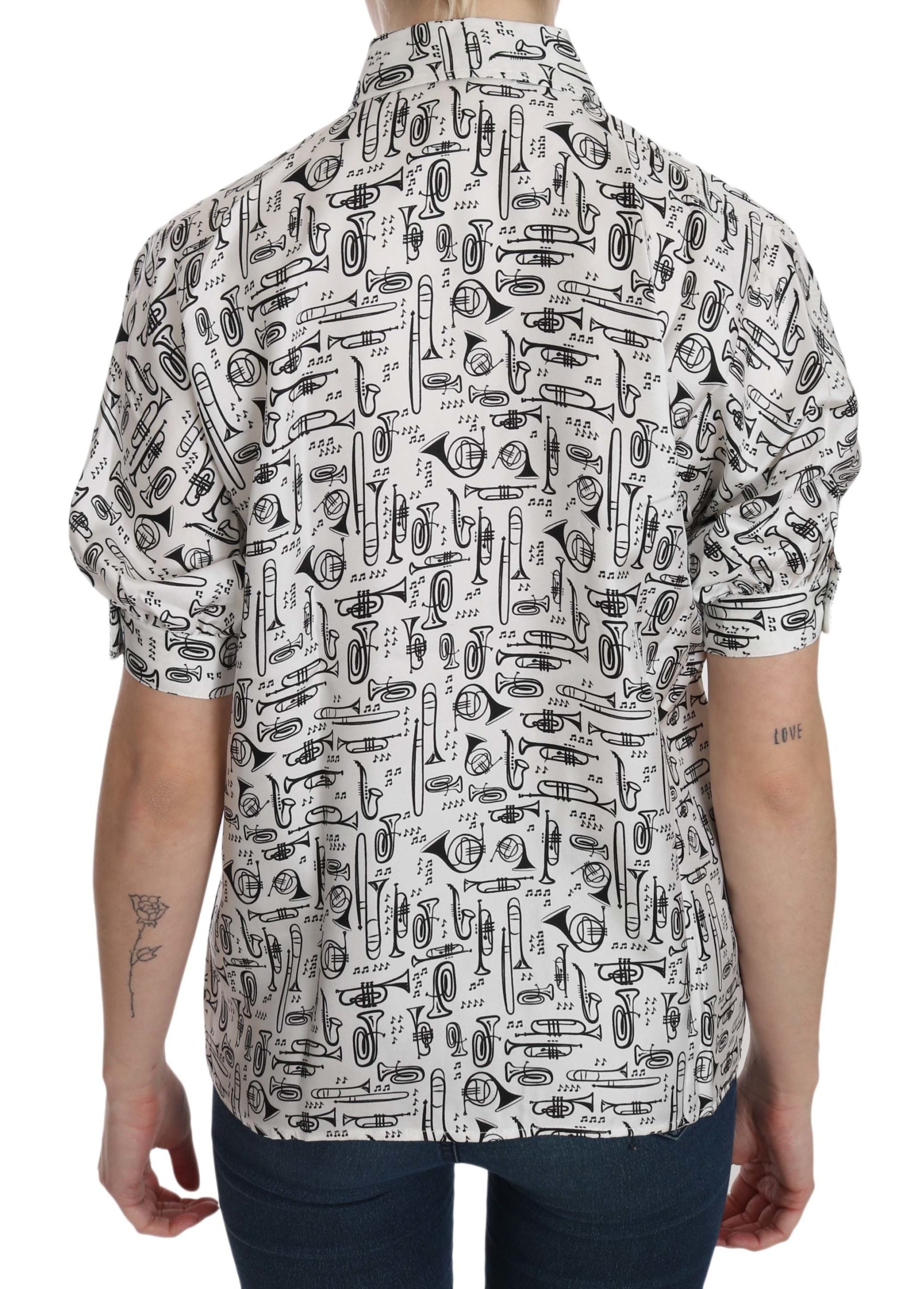 Shirt with black and white pattern featuring various objects and designs