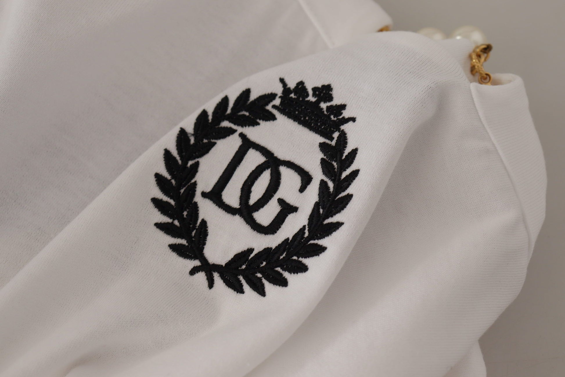 White shirt with black embroidered logo