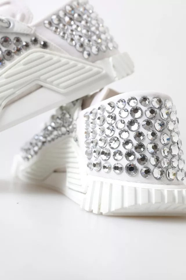 Embellished white sneakers with silver studs and rhinestones
