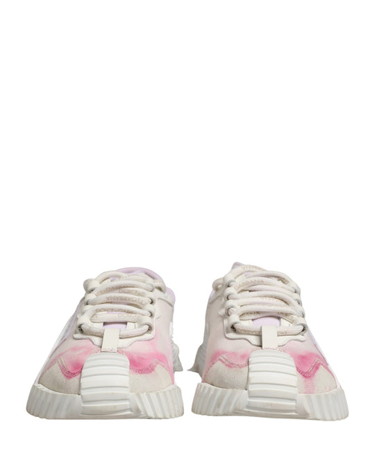 Pink and white lace-up sneakers with a textured sole