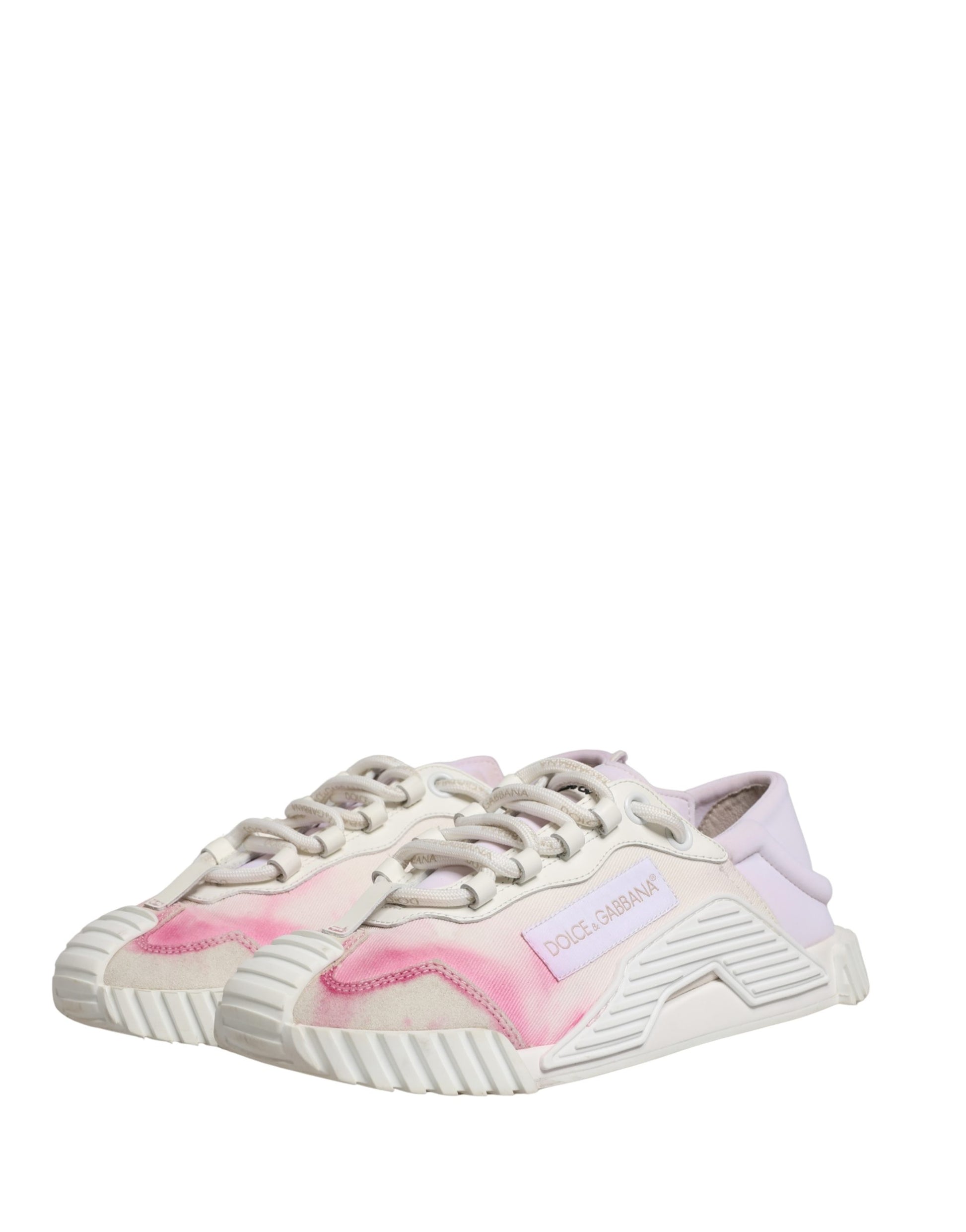 Pink and white lace-up sneakers with a low top, featuring a textured design on the side