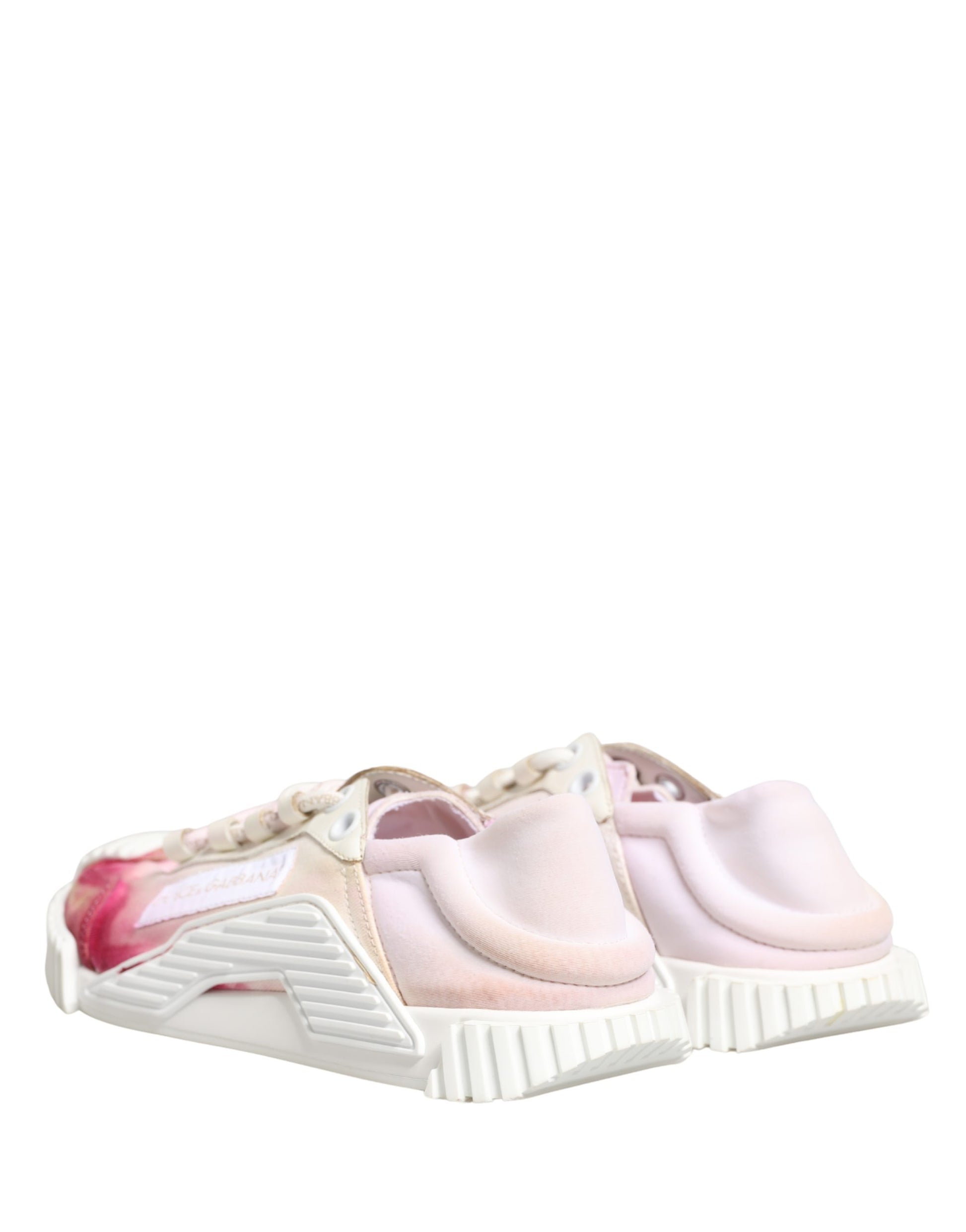 Pink and white lace-up sneakers with a low top, featuring a textured sole