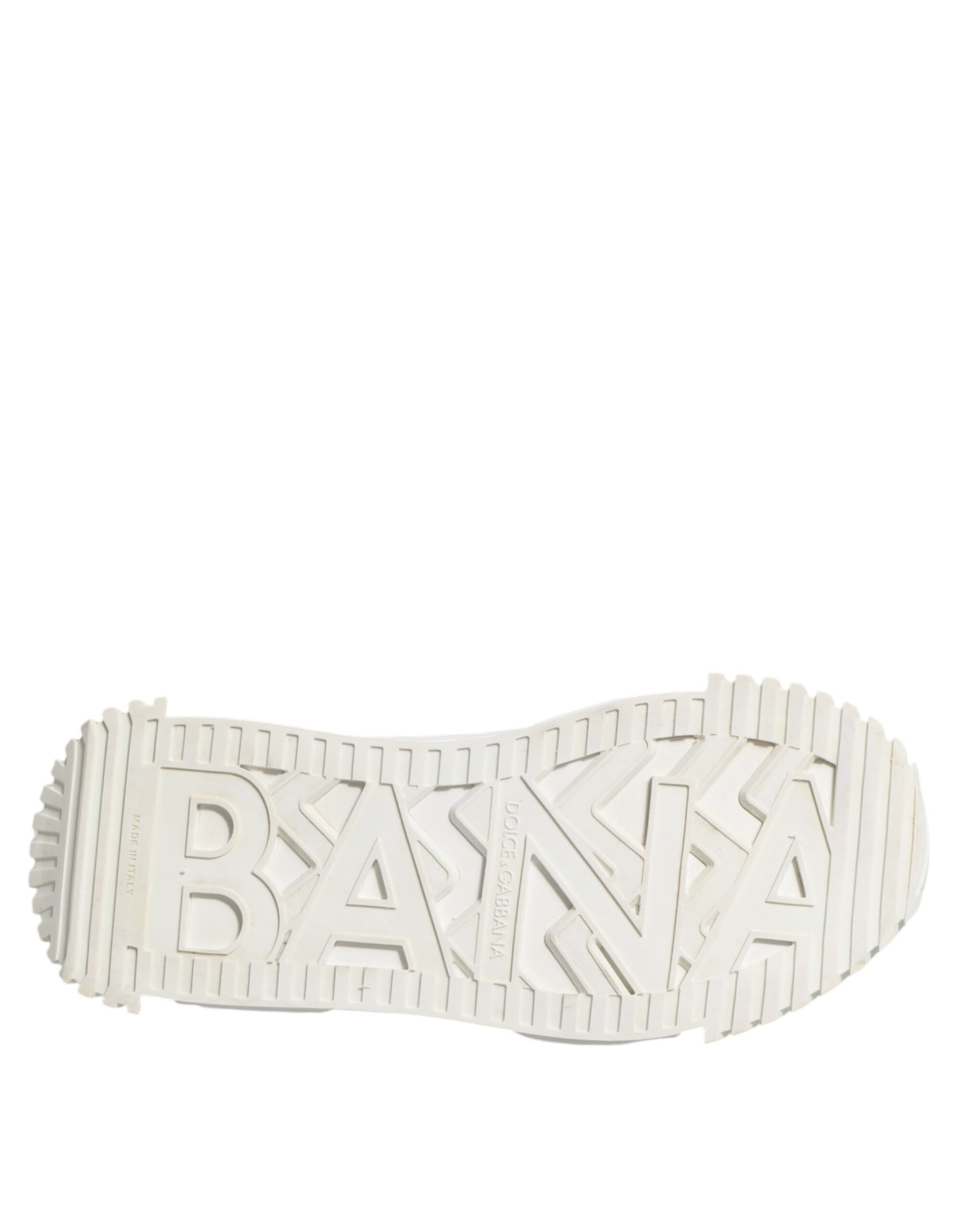 White lace-up sneakers with brand name on side