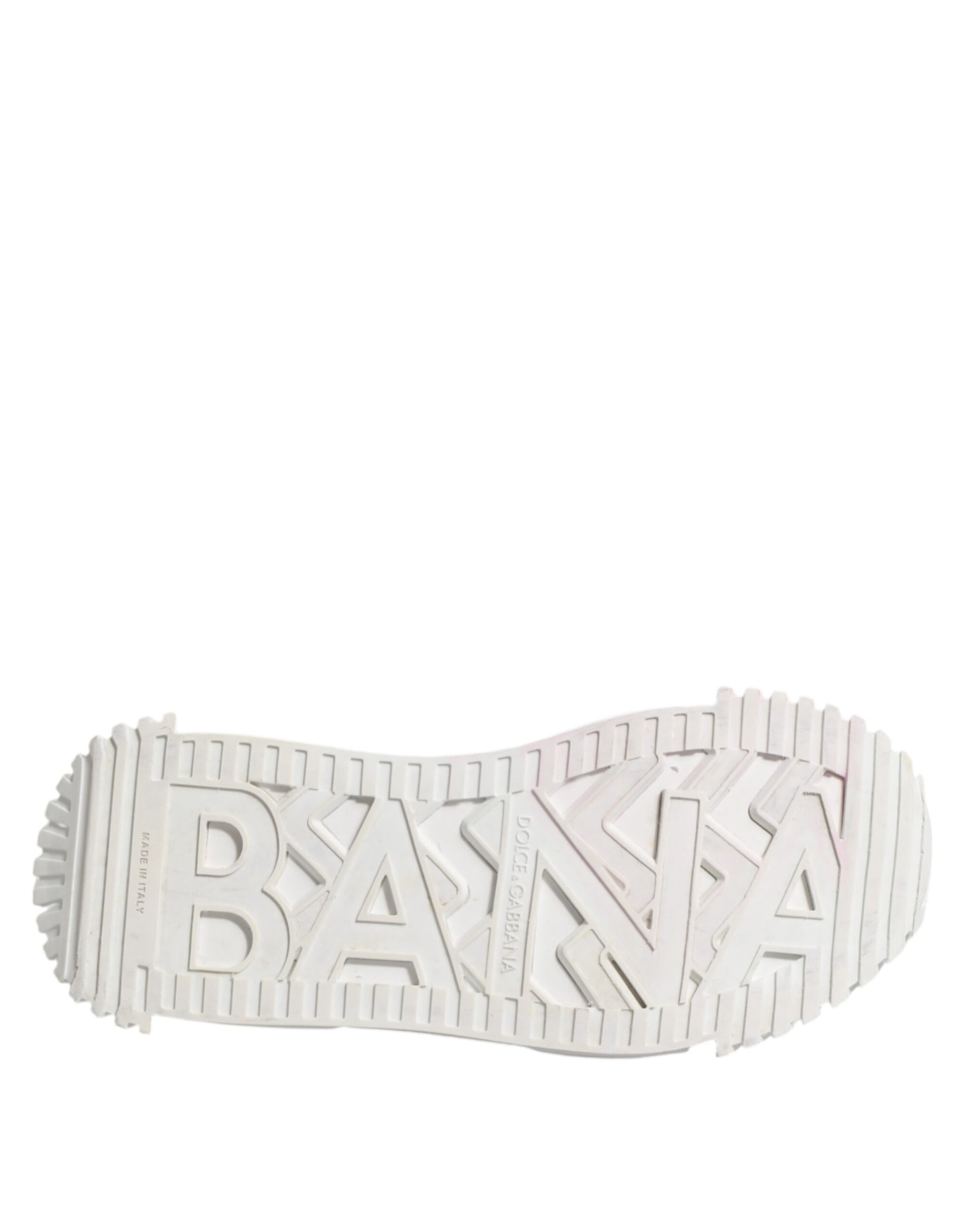 A pair of white lace-up sneakers with the word "BANANA" written across them