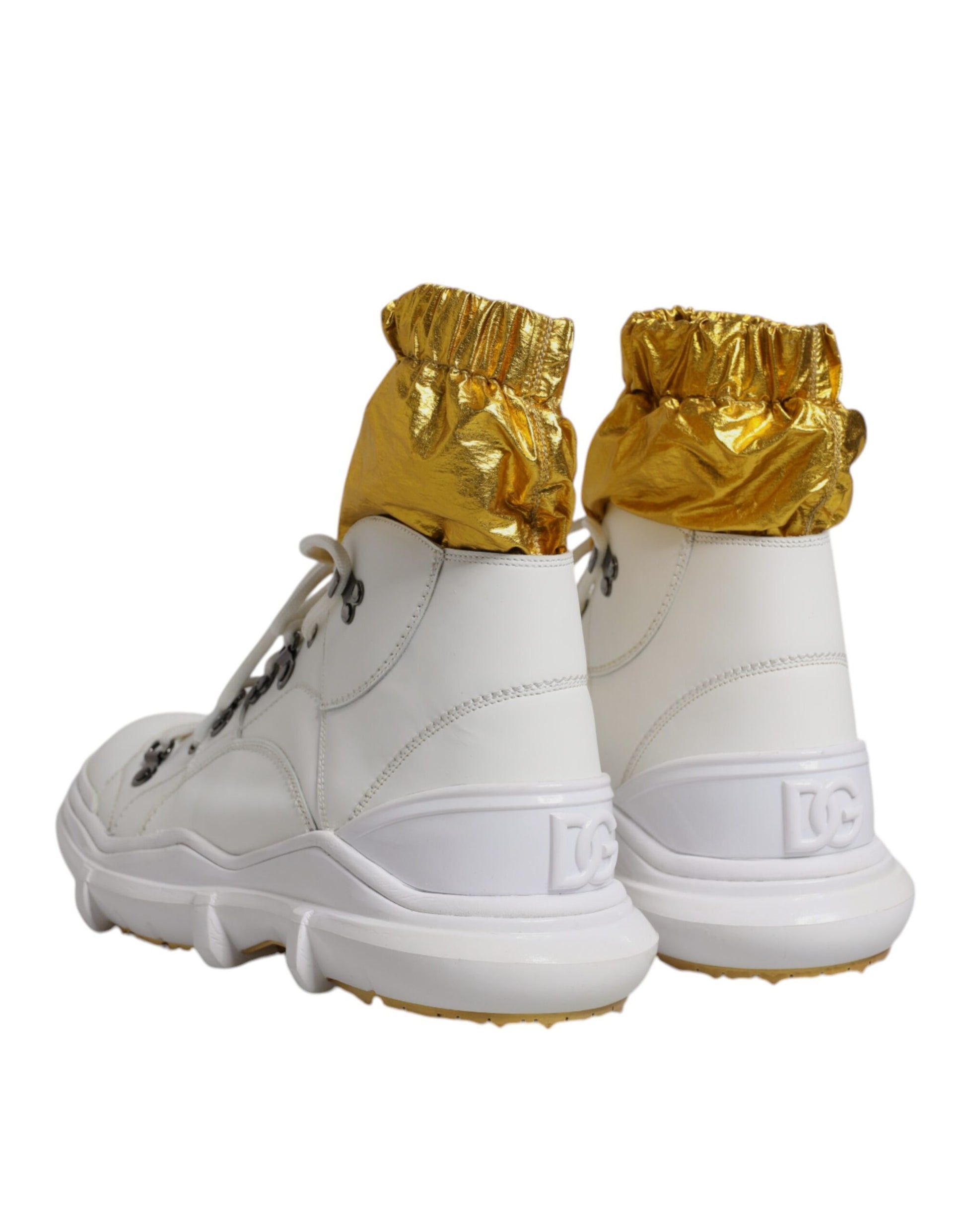 White nylon sneakers with gold accents, featuring a high top design