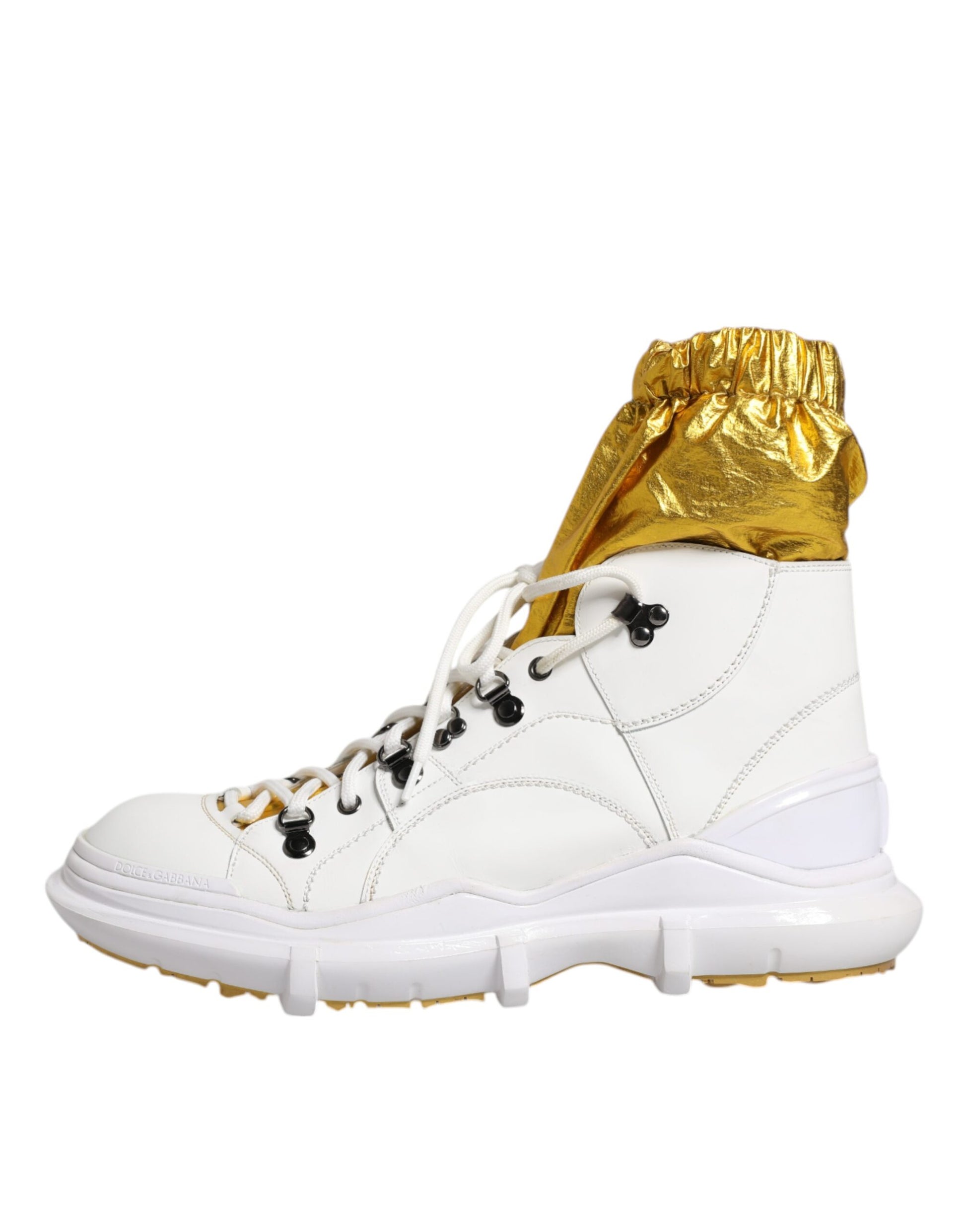 White nylon sneakers with gold accents, featuring high top design and chunky sole
