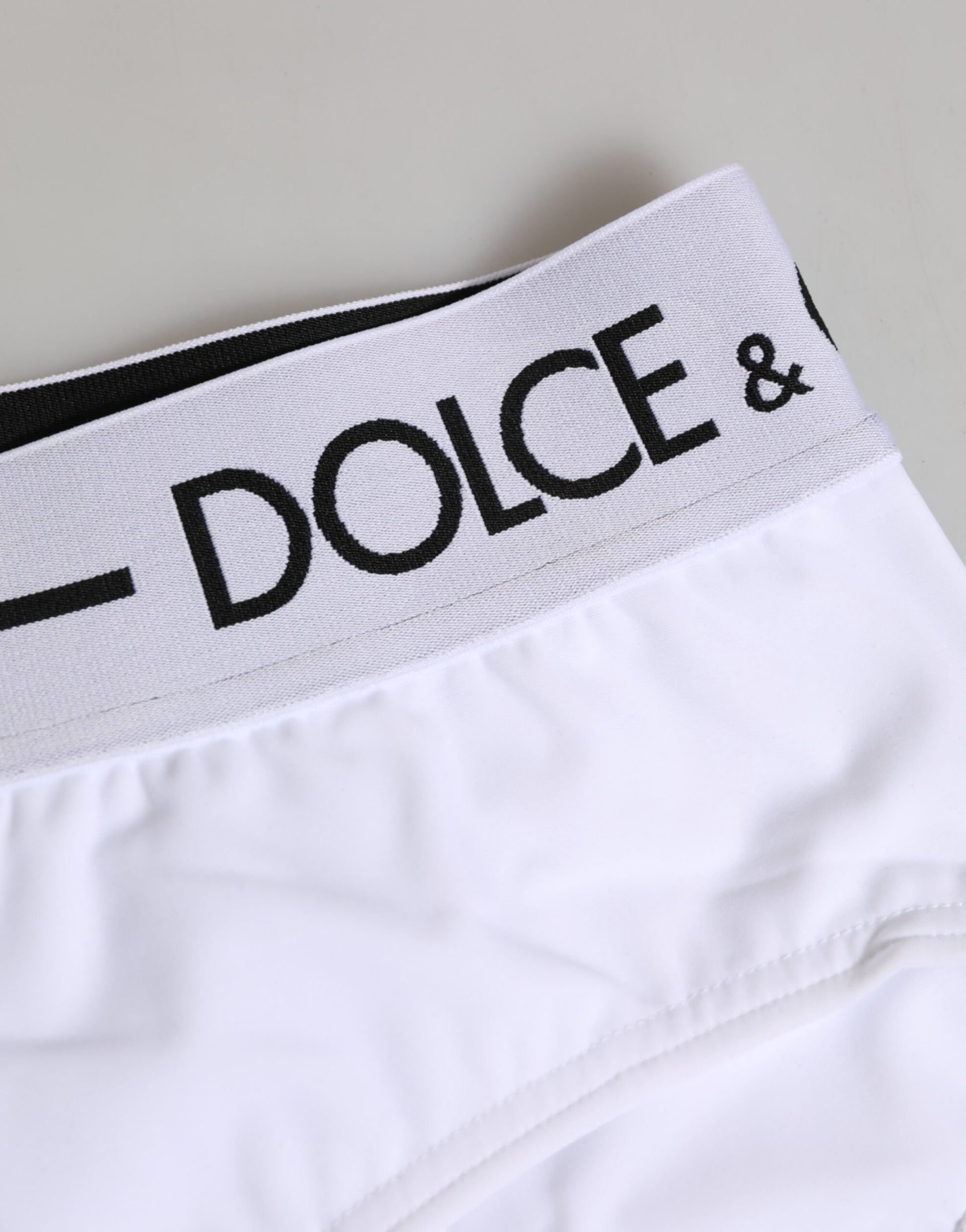 White nylon underwear with black and white logo waistband