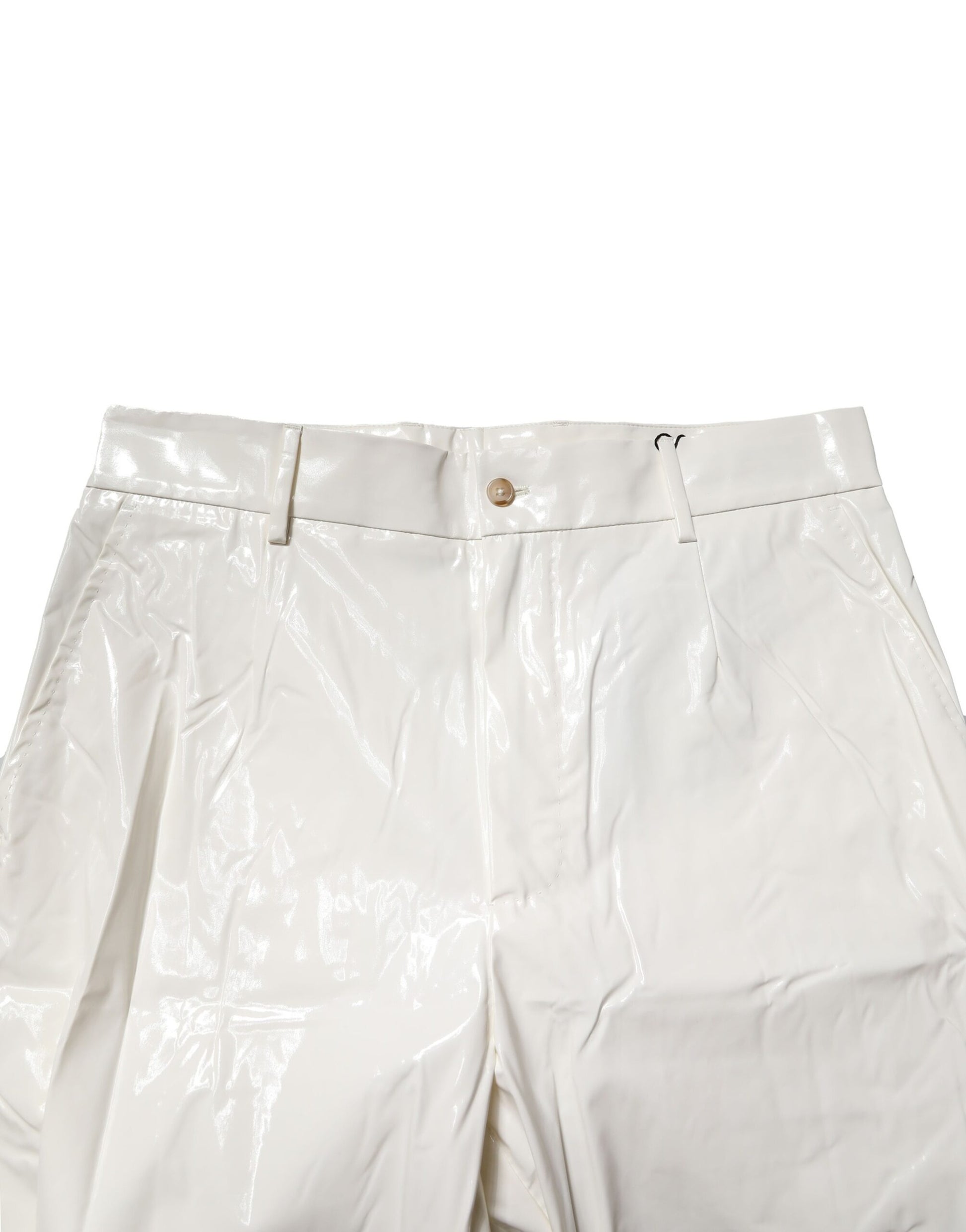A pair of white nylon tapered dress pants with a button and zipper closure