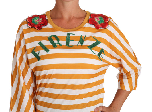Yellow sweater with red flowers on shoulders