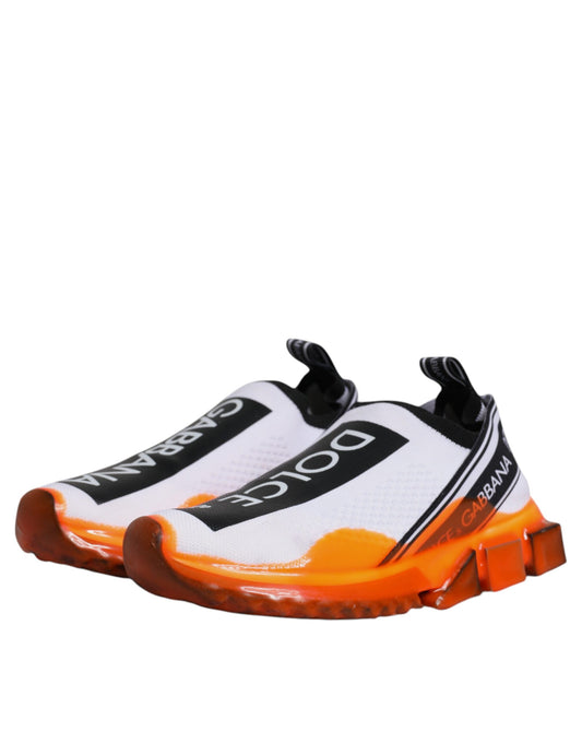 White and orange slip on shoes with white laces