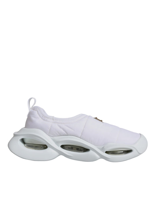 White sneakers with three wheels on each foot