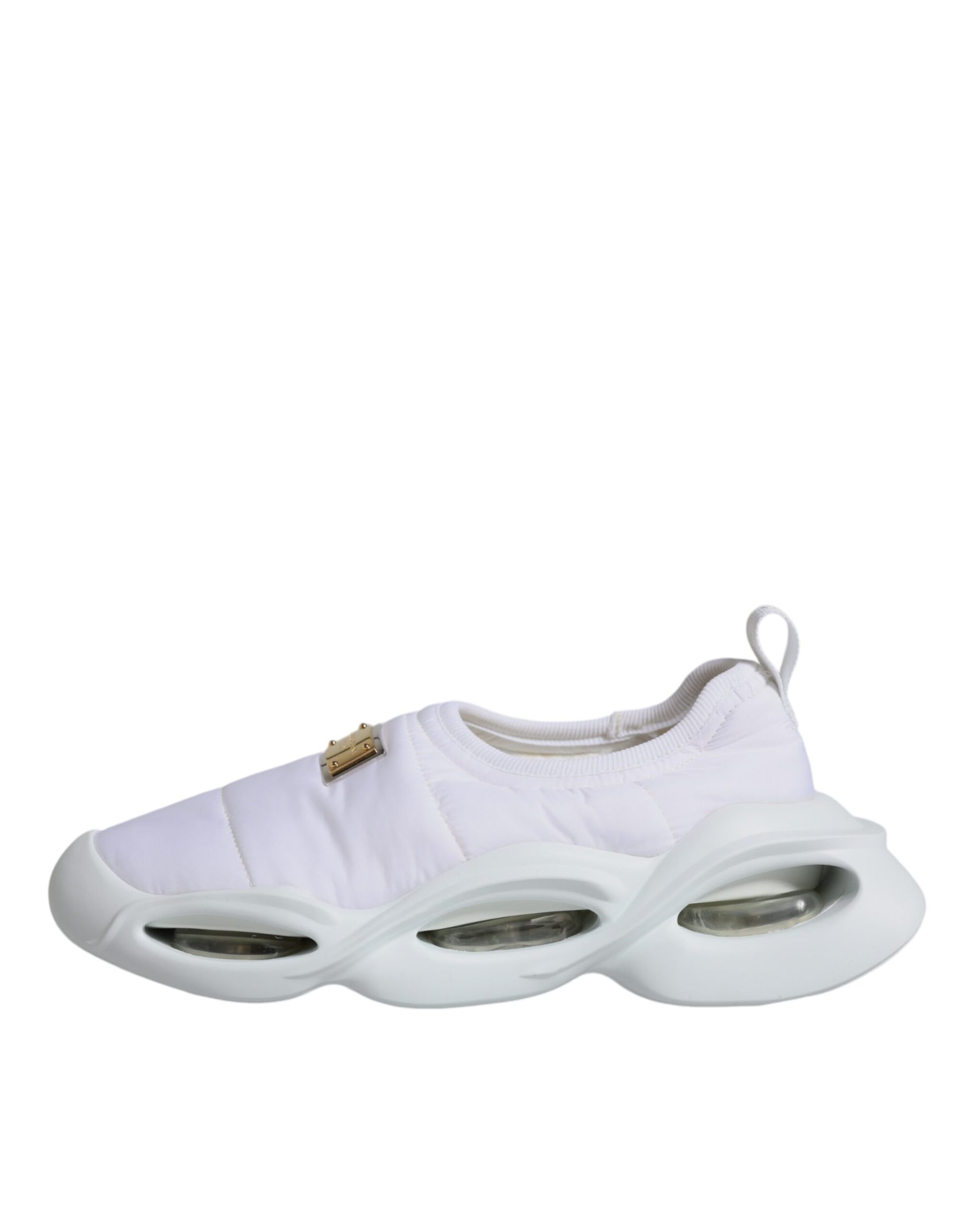White sneakers with three stripes on side and laces tied in front
