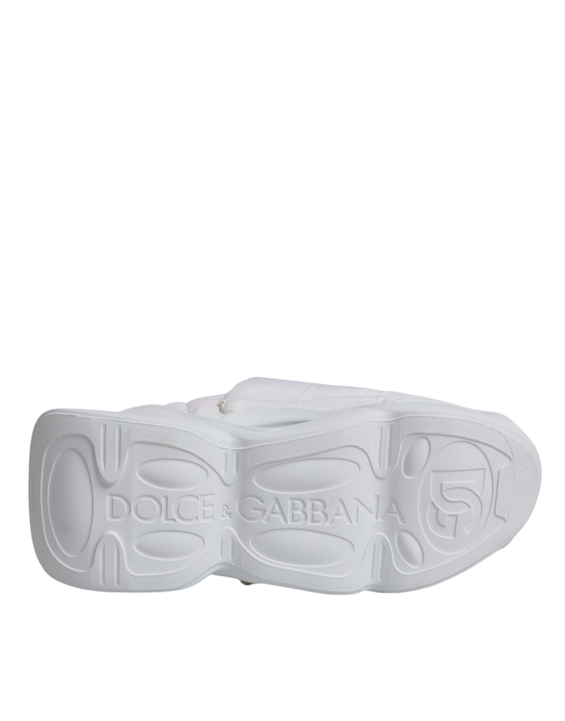 A pair of white padded fabric low top sneakers with the Dolce & Gabbana logo