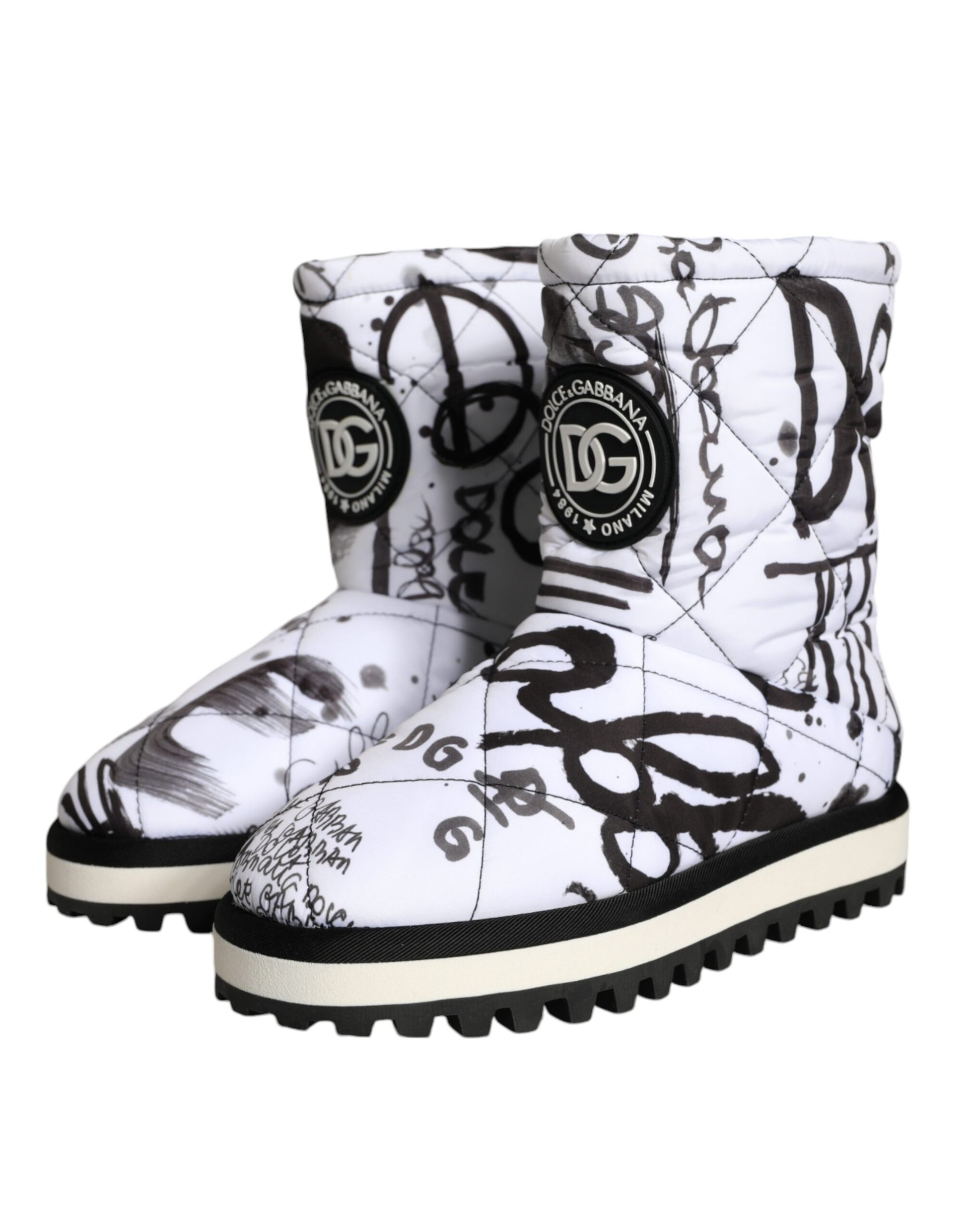 White snow boot with black writing on side