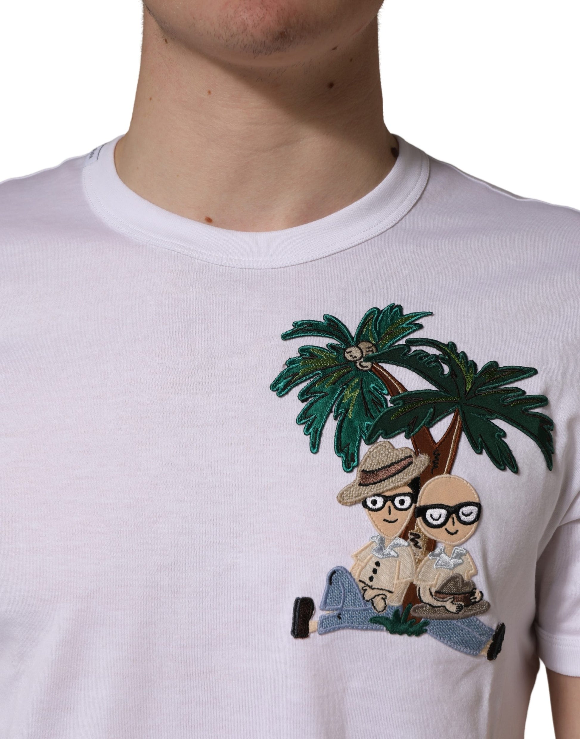 White t-shirt with cartoon palm tree on front