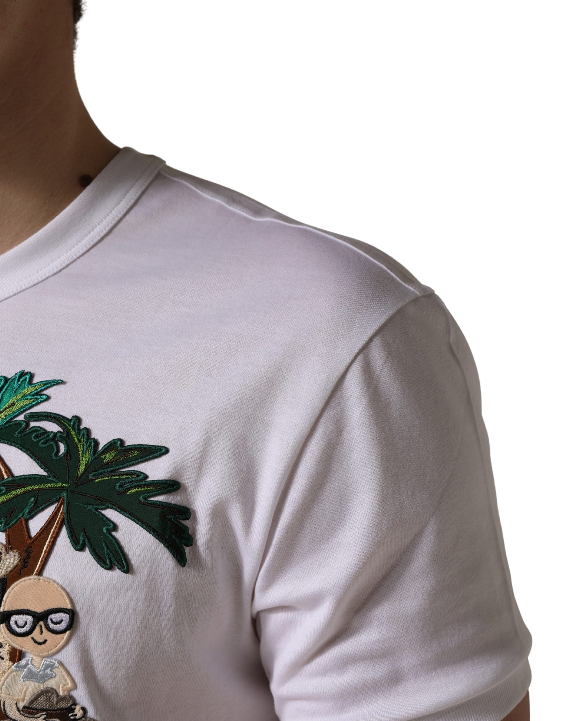 White graphic t-shirt with palm tree design on front