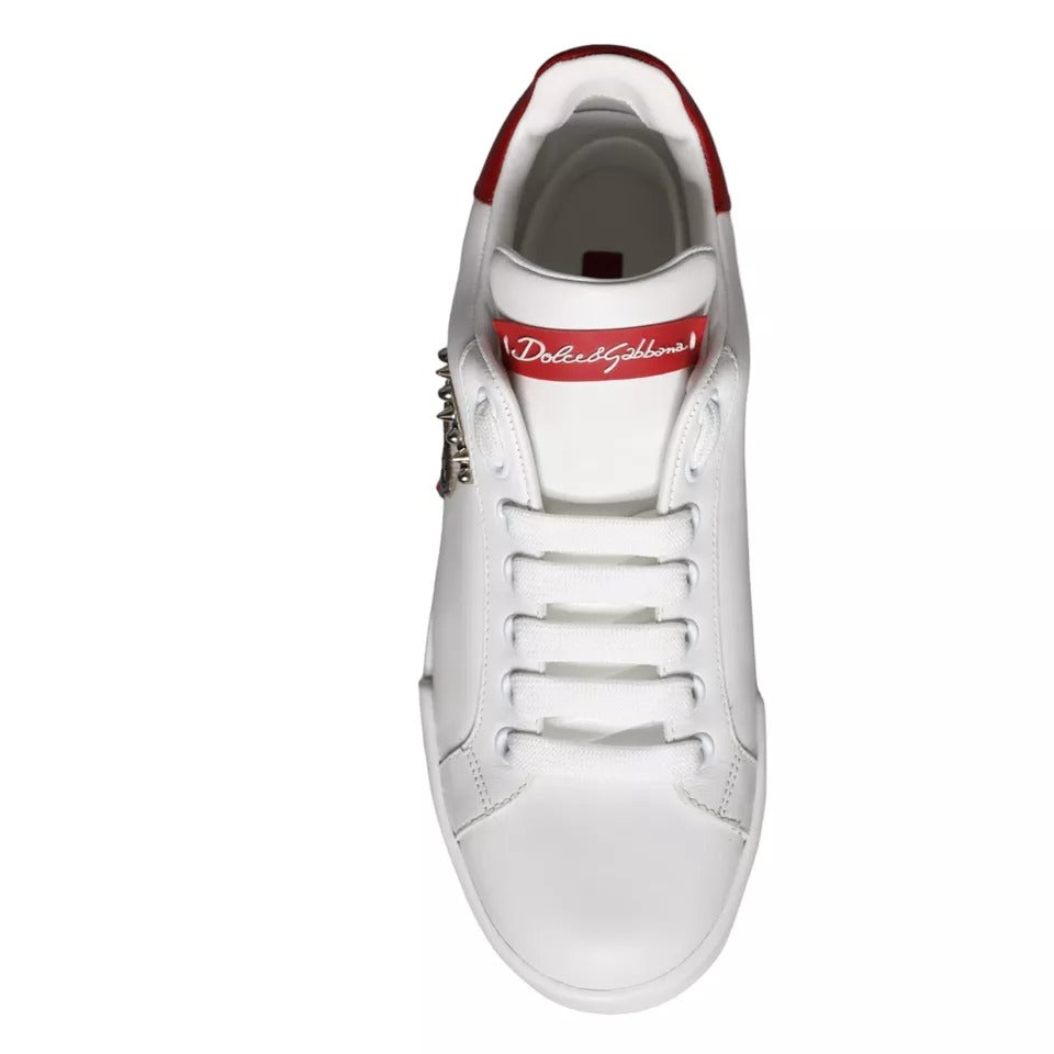 White sneaker with red logo and laces