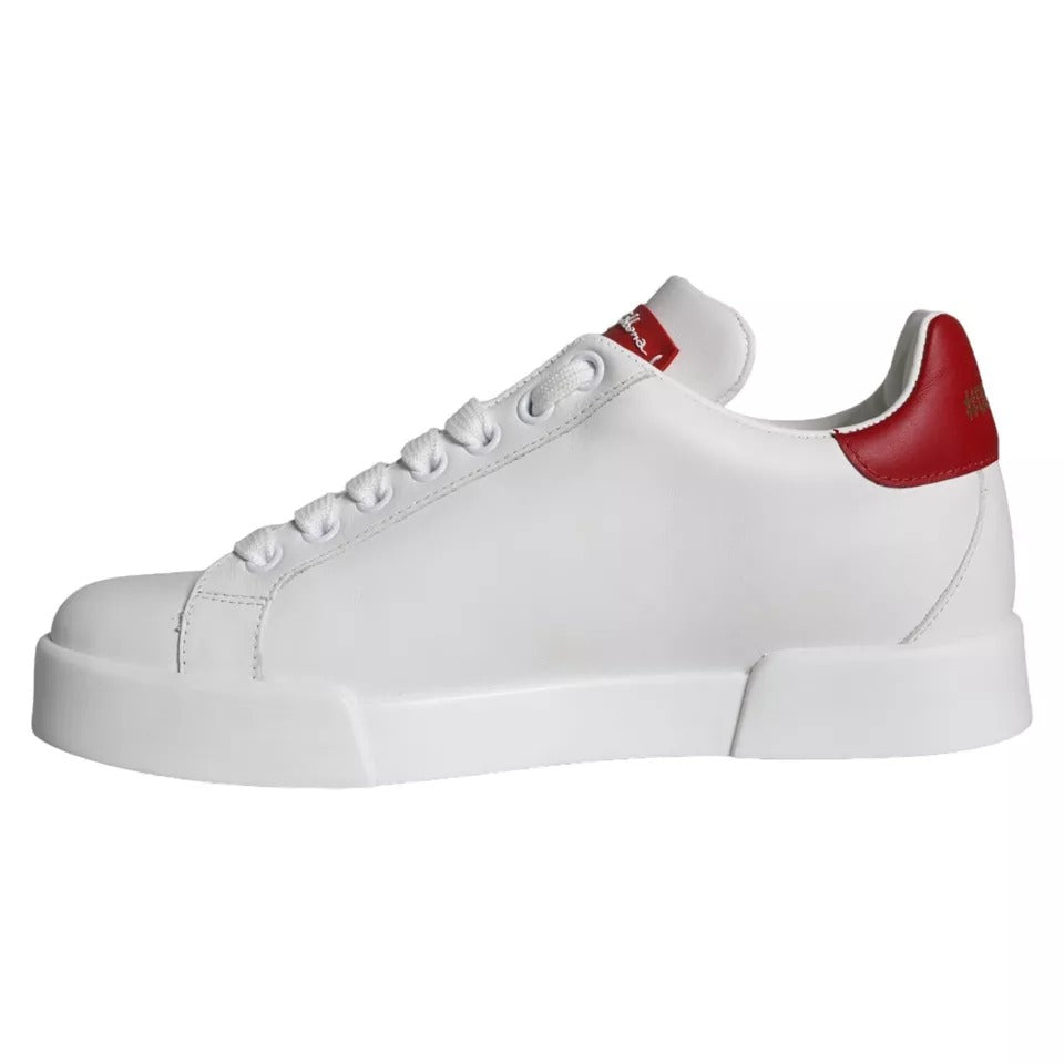 White sneaker with red accents and laces