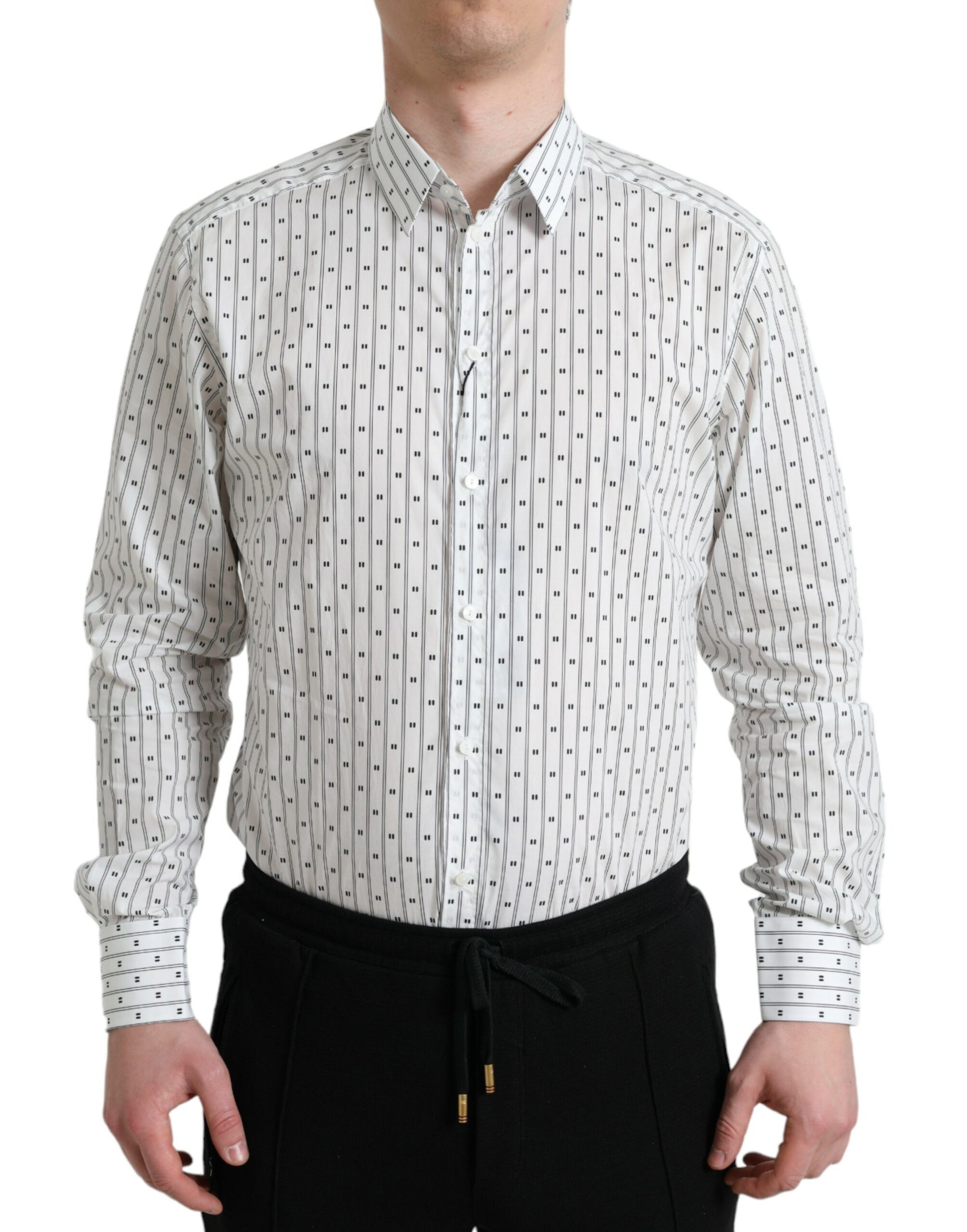 Man wearing a patterned shirt with long sleeves