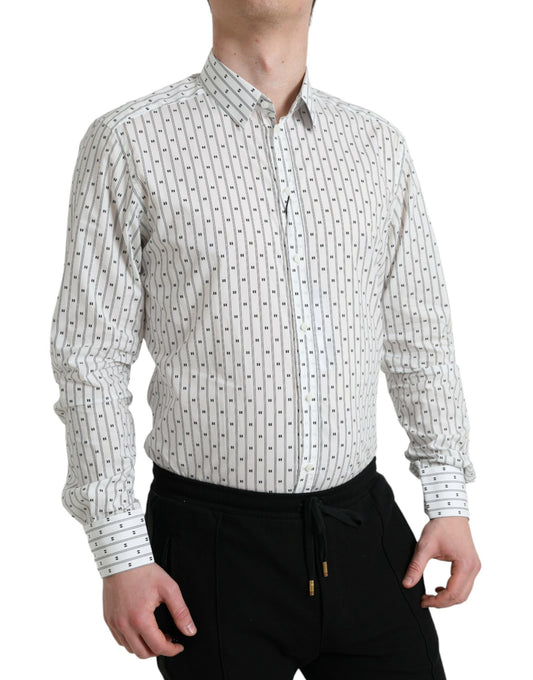 Man wearing a patterned shirt and black pants