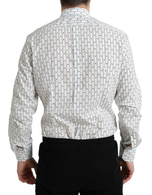 Man wearing a patterned shirt and black pants
