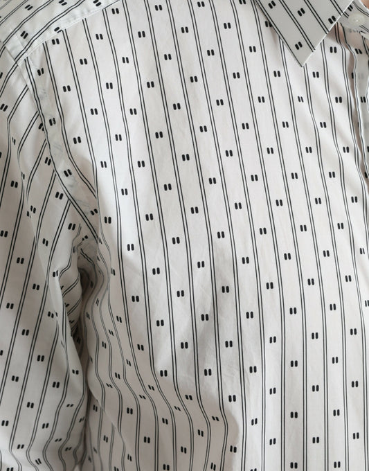 The shirt has a pattern of black lines on a white background