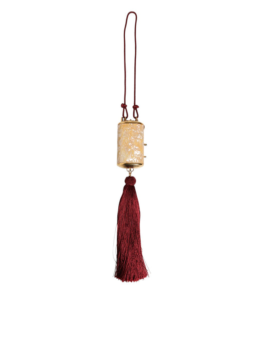 Decorative bell with red tassel