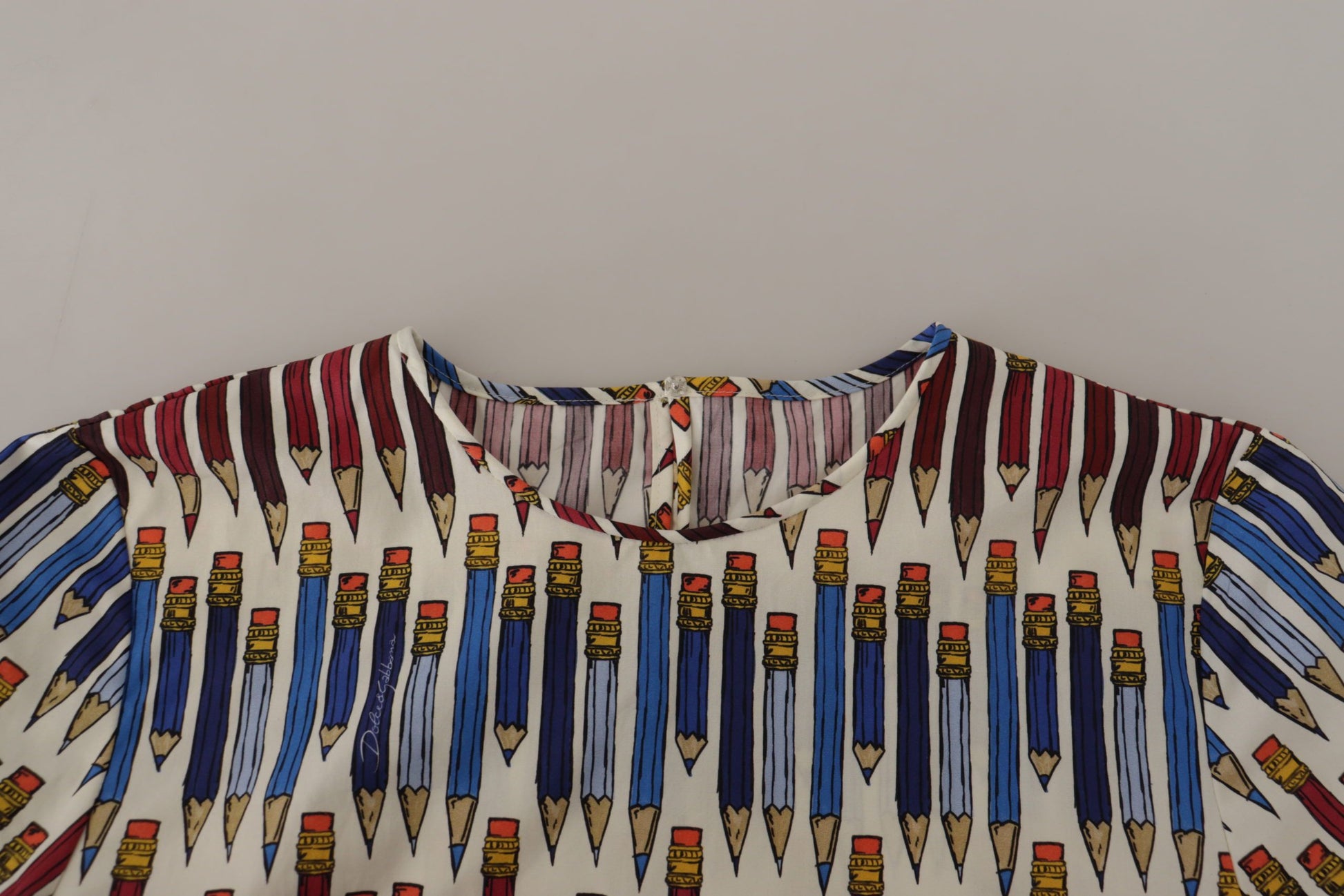 Patchwork shirt with pencils as a design element