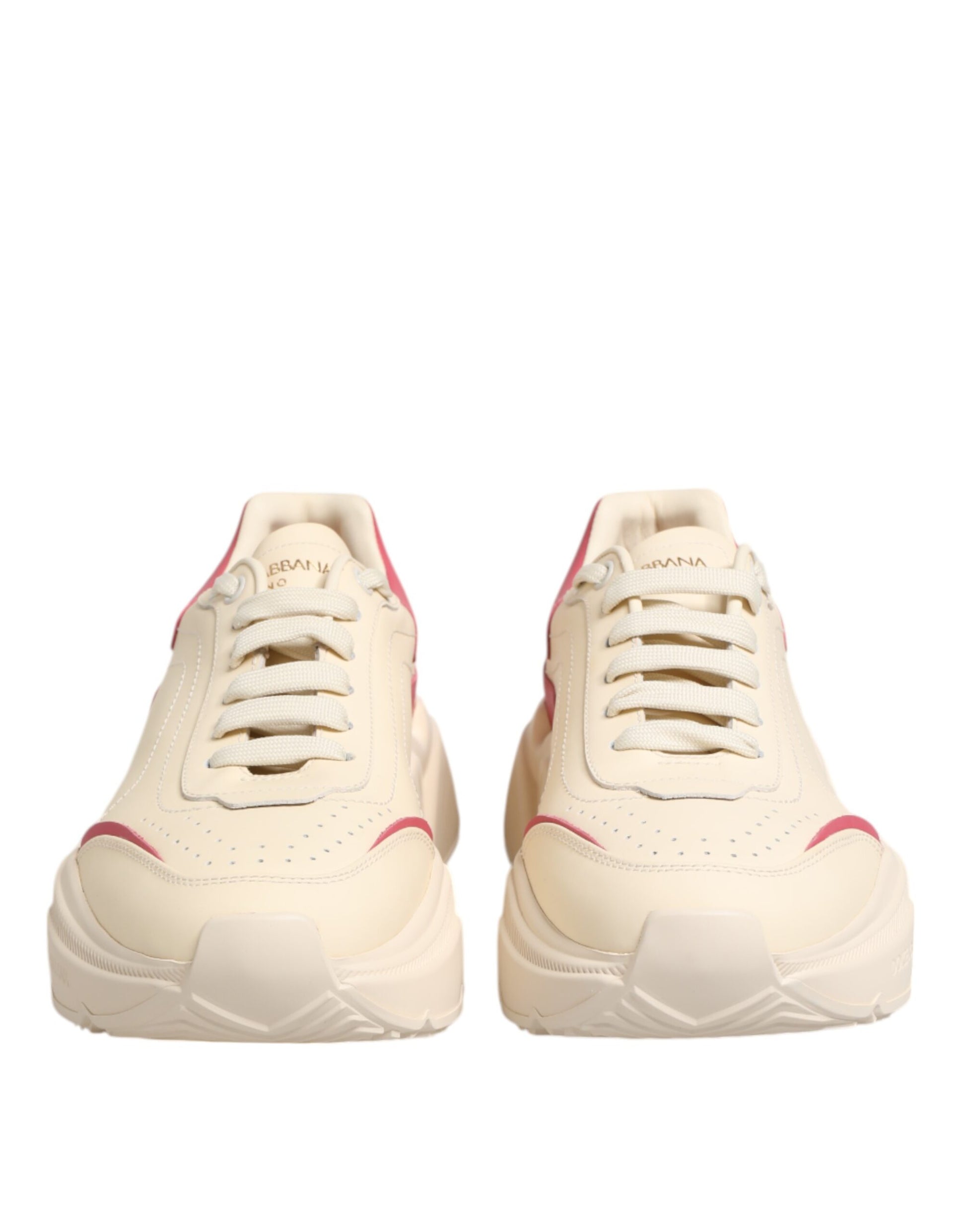 Tan and pink leather sneakers with white laces, featuring a low-top design