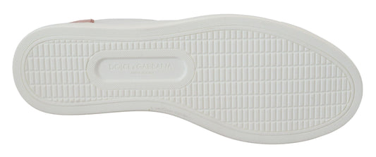 Pair of white sneakers with black laces and a red logo on the side