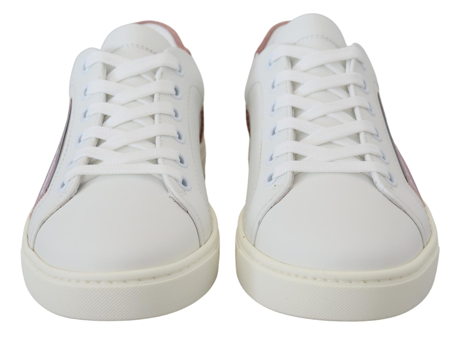 Pair of white sneakers with red accents and laces