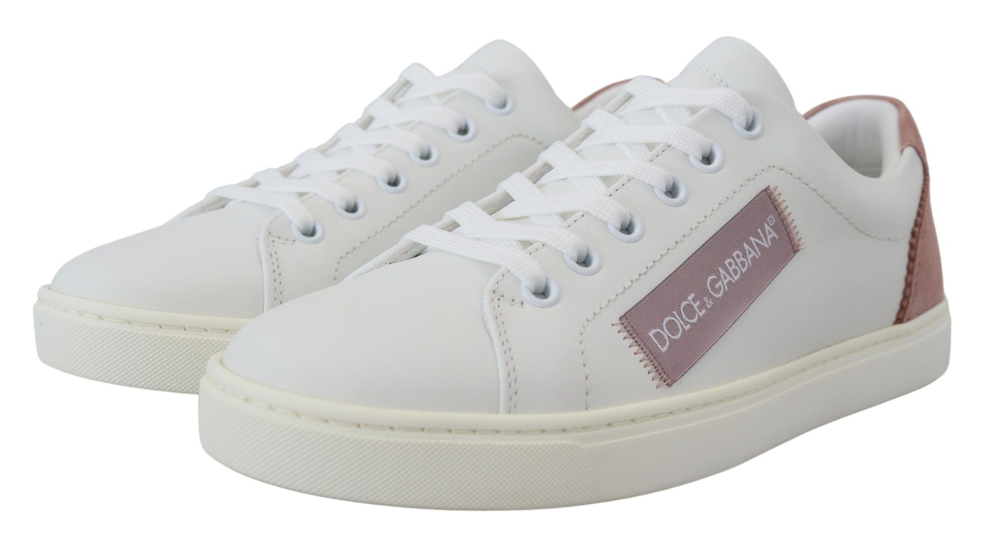 Pair of white sneakers with red accents and a logo on the side