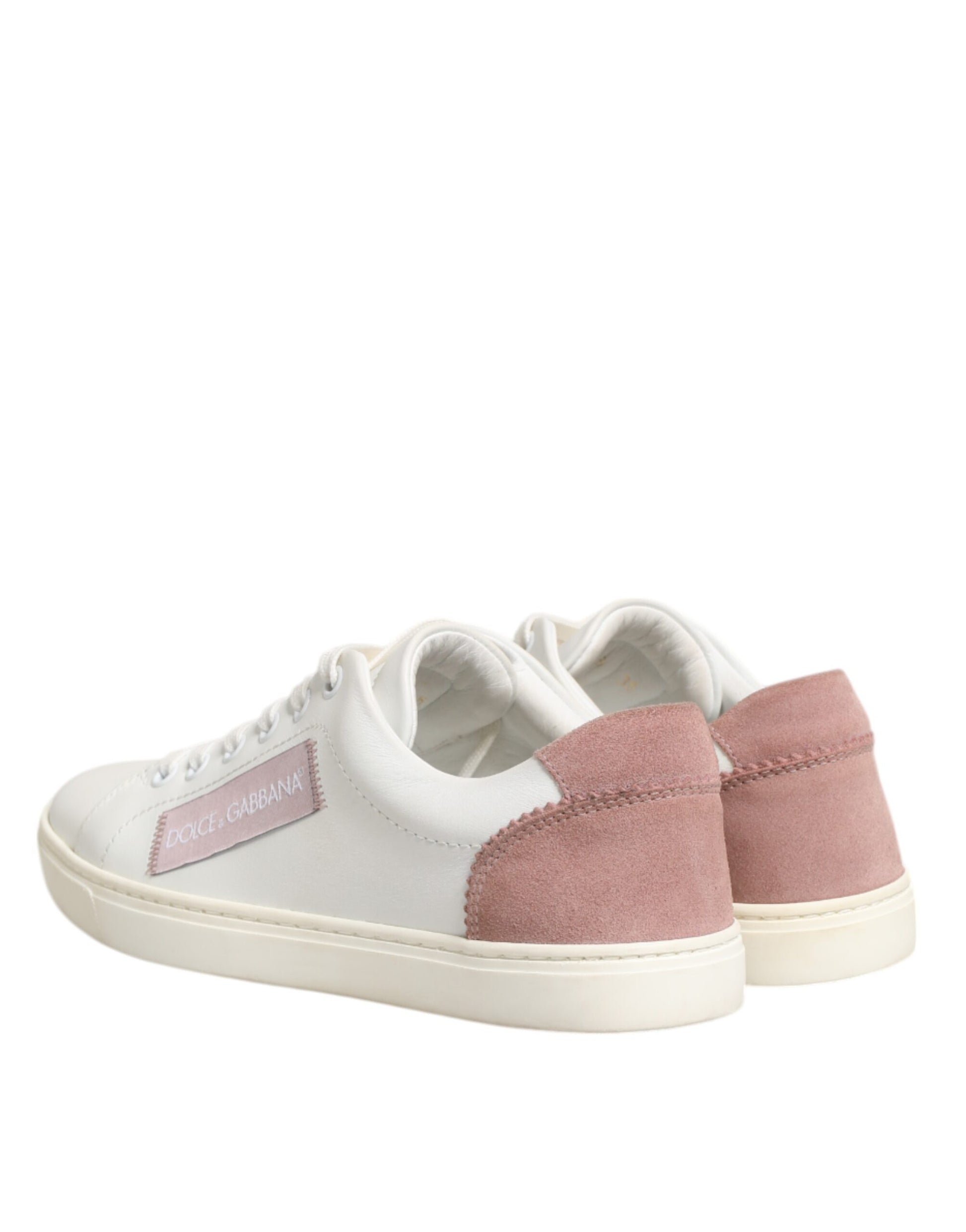 Pair of sneakers with pink accents