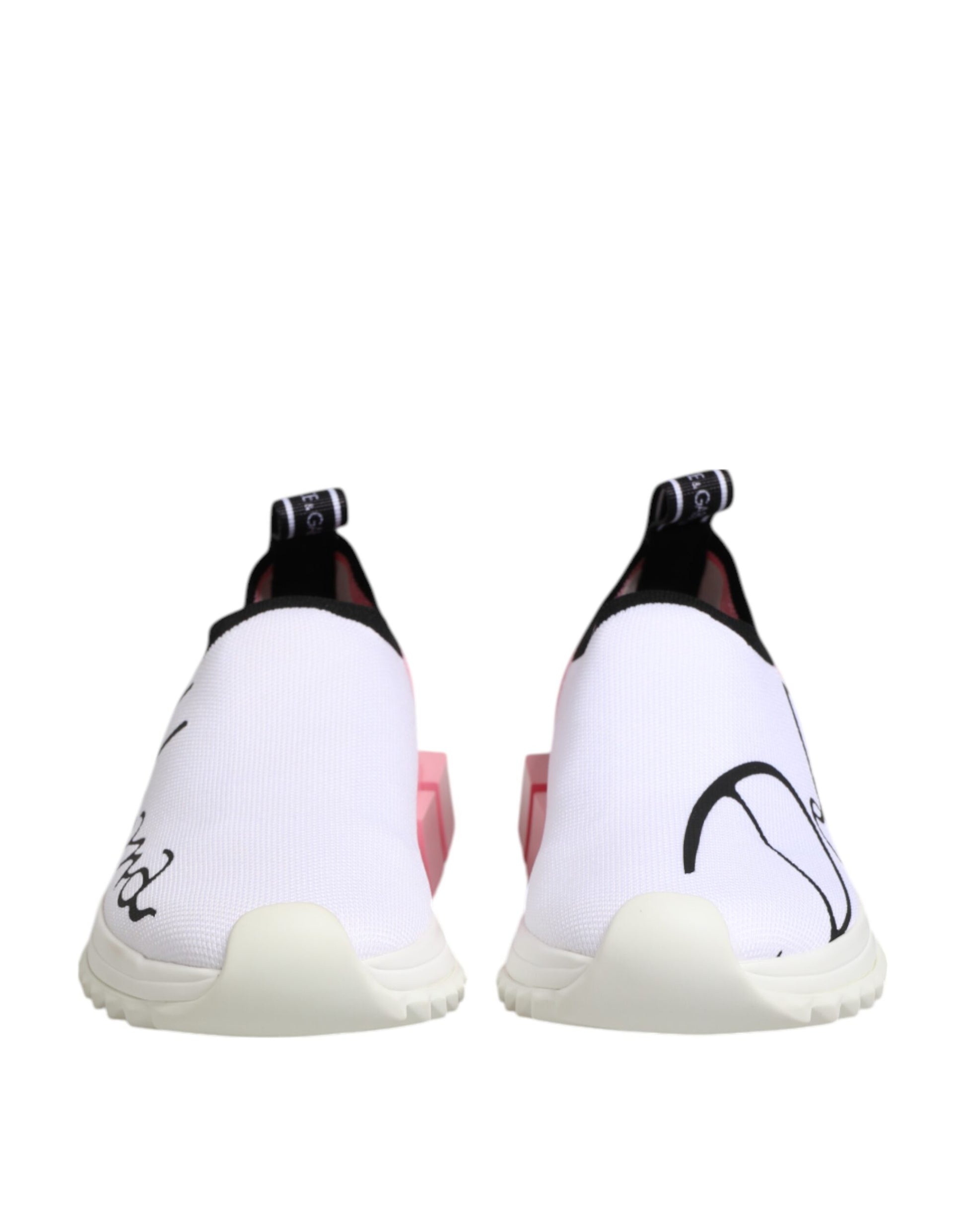 White pink low top sneakers with black laces and logo on side