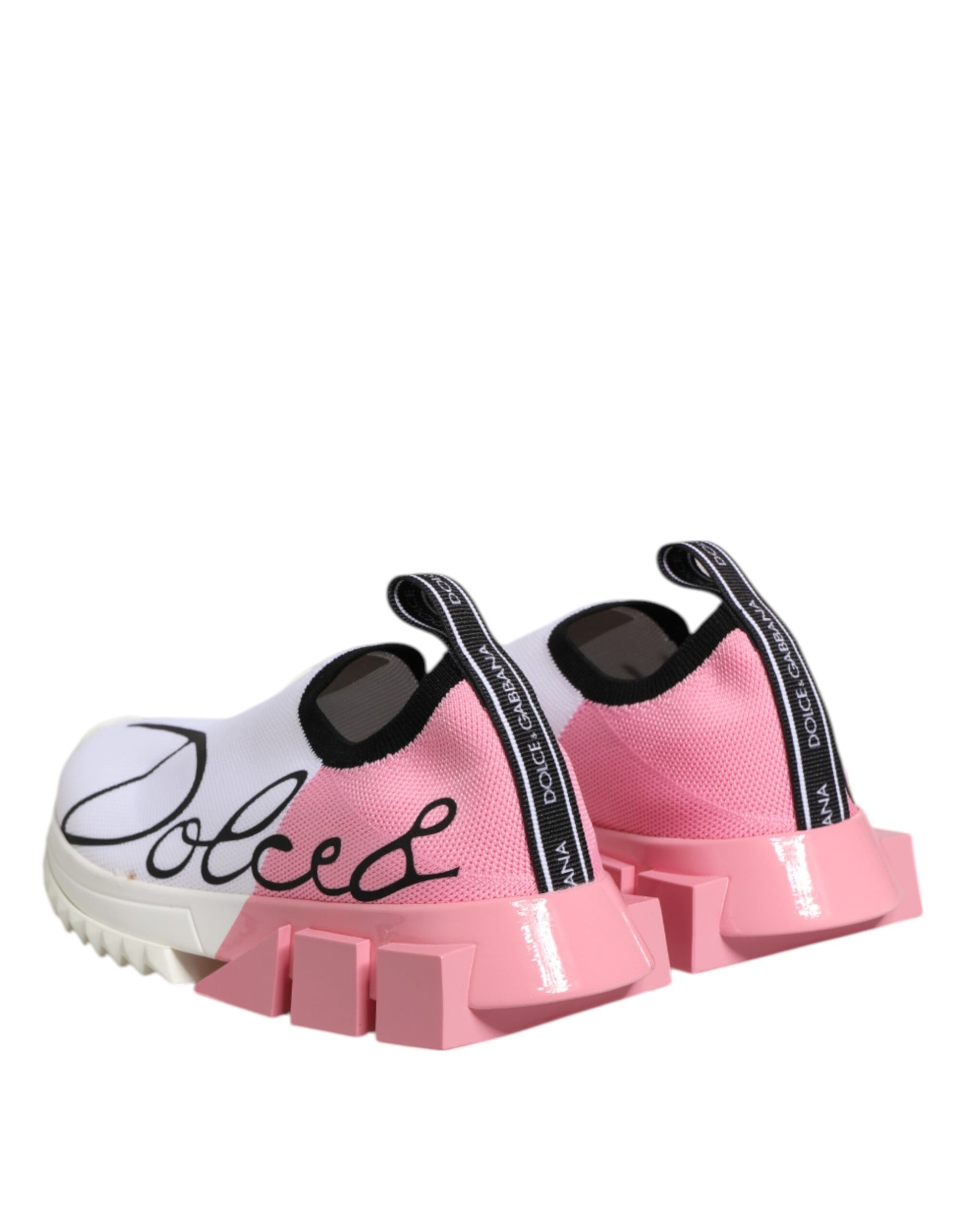 Pink and white sneakers with brand name on side