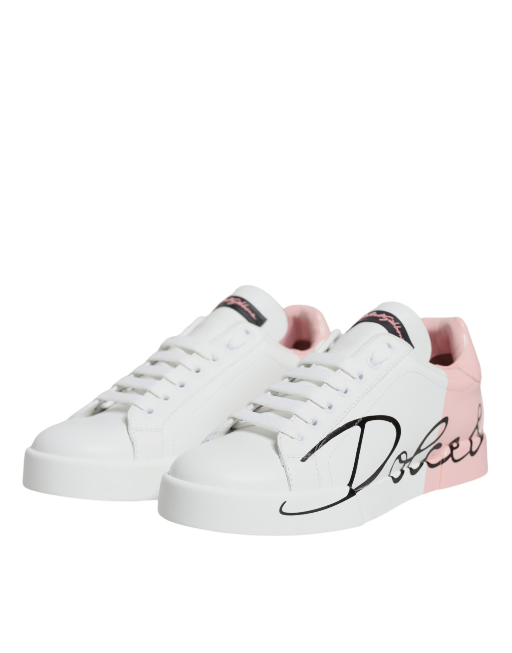 Pair of white sneakers with pink accents and black laces