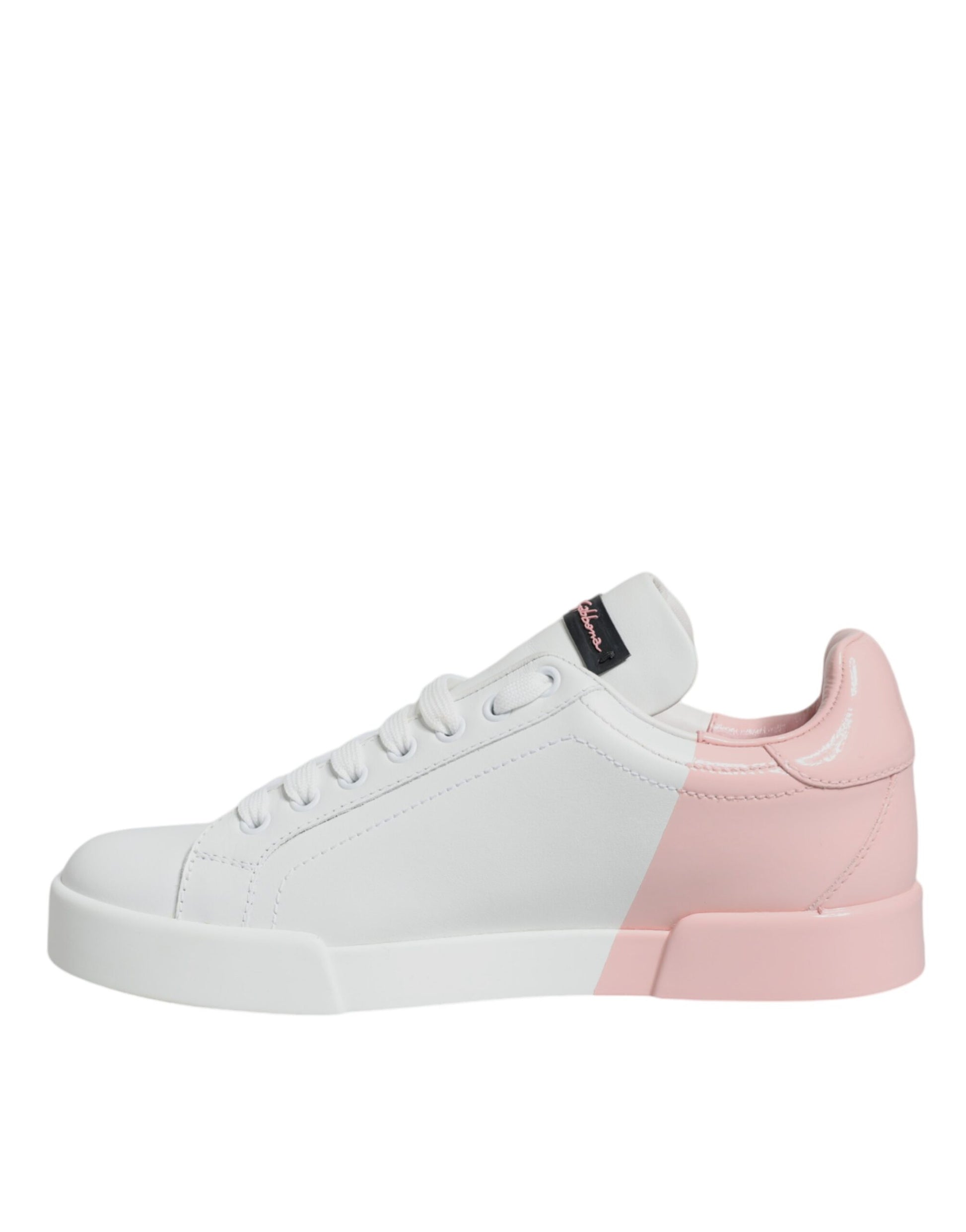 Pink and white sneakers with laces