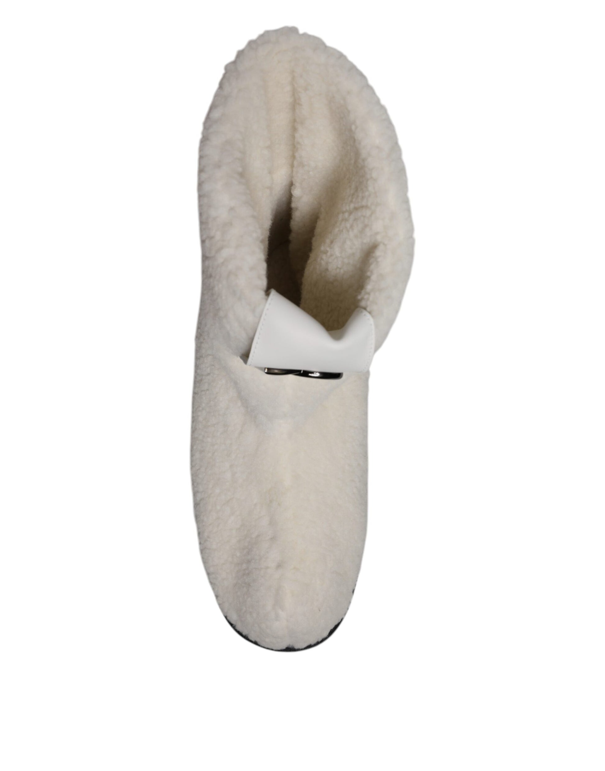 Tan slipper with black trim
