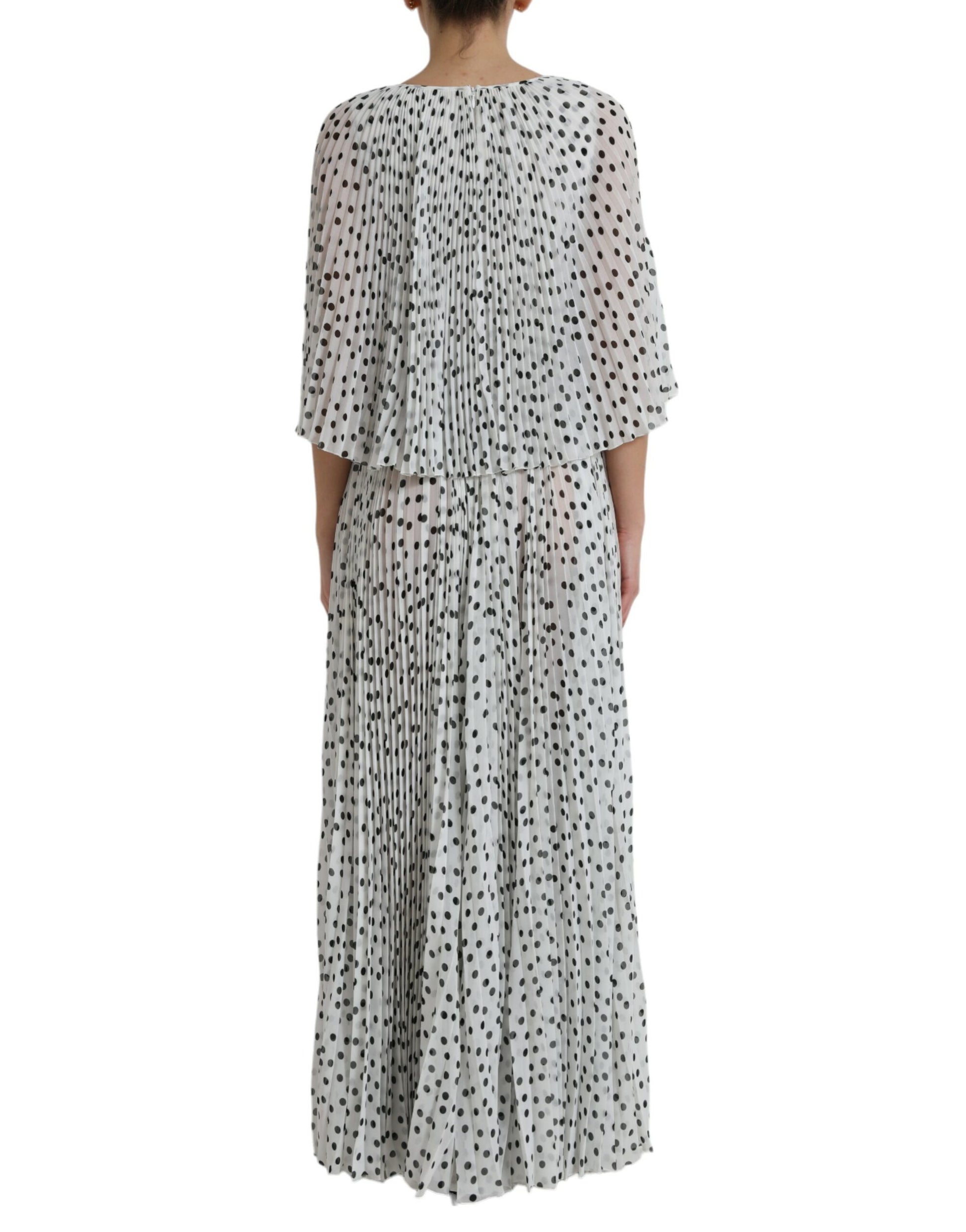 Long sleeve white polka dot maxi dress with pleats and ruffles