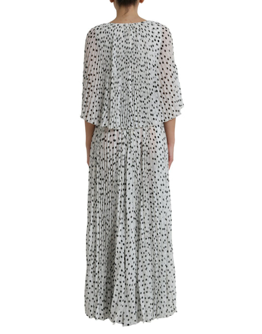 Long sleeve white polka dot maxi dress with pleats and ruffles