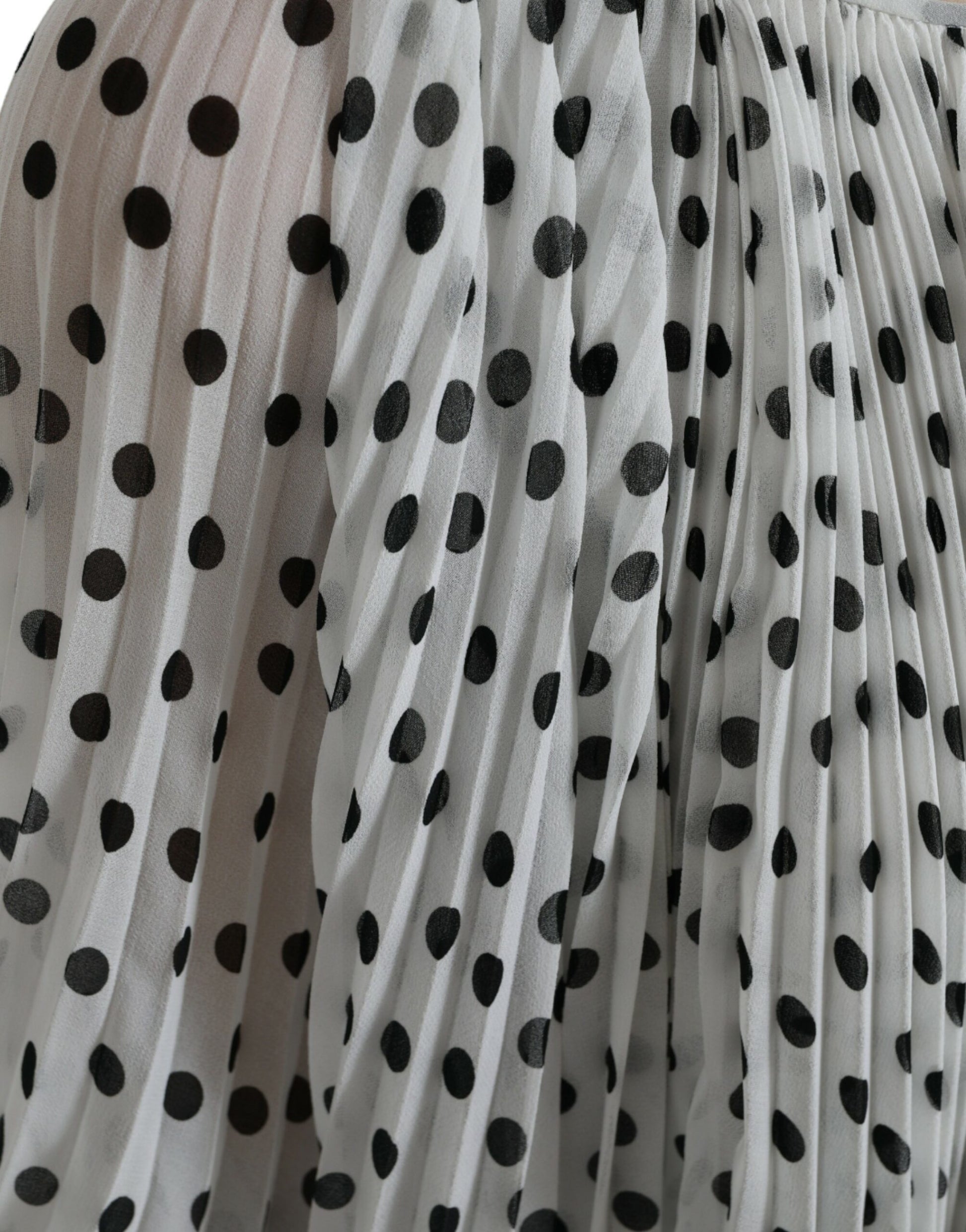 White polka dot pleated maxi dress by Dolce & Gabbana