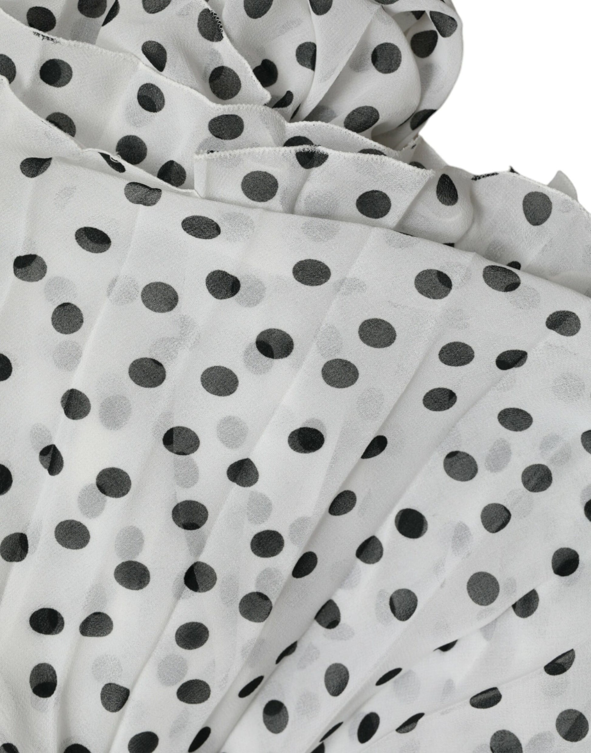 White polka dot pleated maxi dress with A-line silhouette