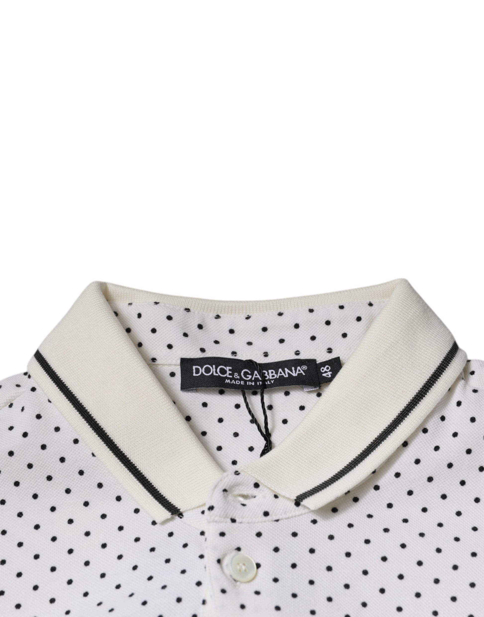 Polka dot shirt with black collar and buttoned front