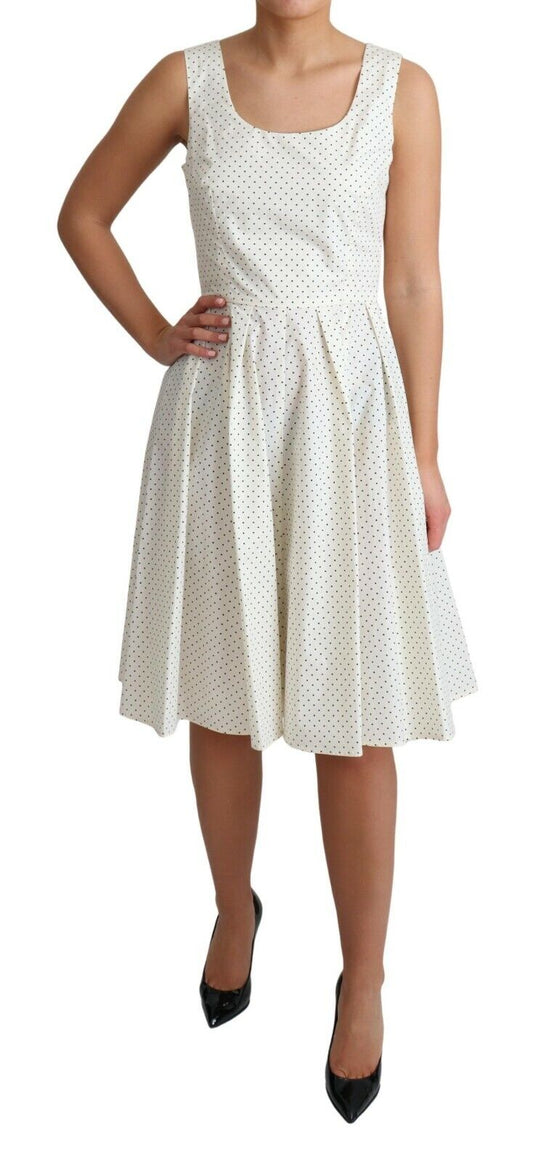 White polka dotted cotton dress with A-line skirt
