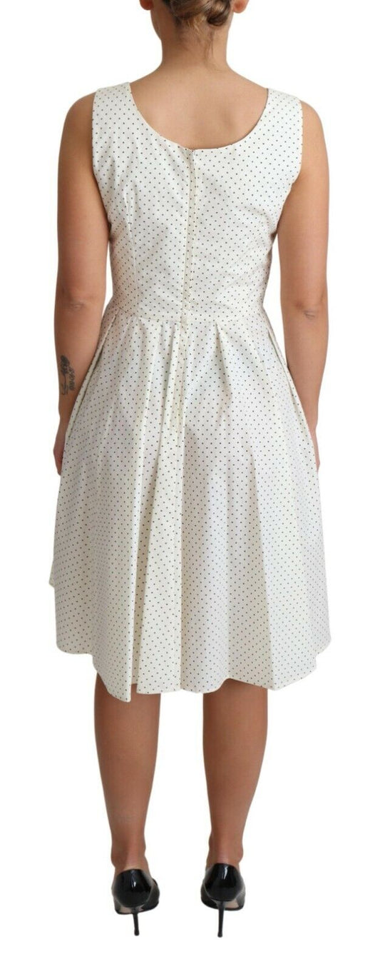 A-line dress with polka dots, cotton fabric, white color, sleeveless design