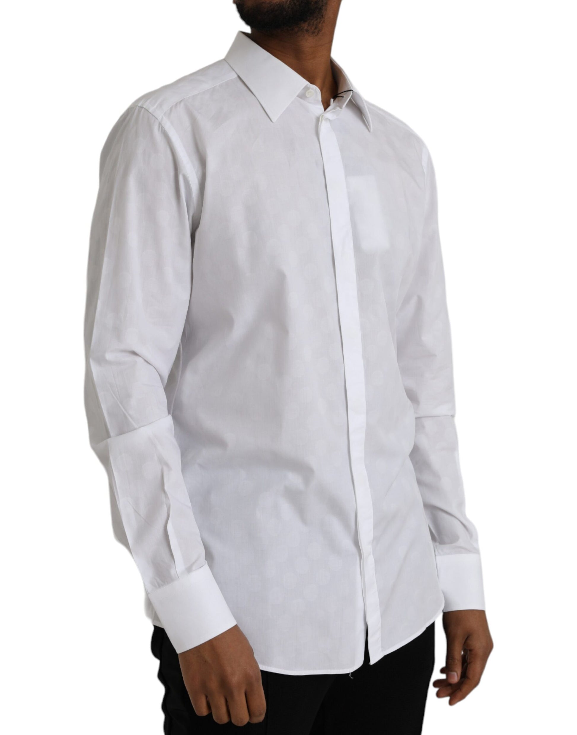 A white polka dotted cotton dress shirt with long sleeves and a collar
