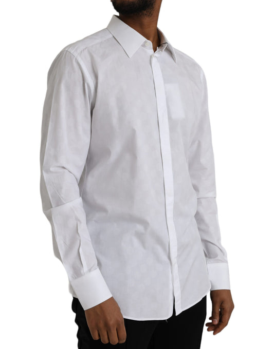 A white polka dotted cotton dress shirt with long sleeves and a collar